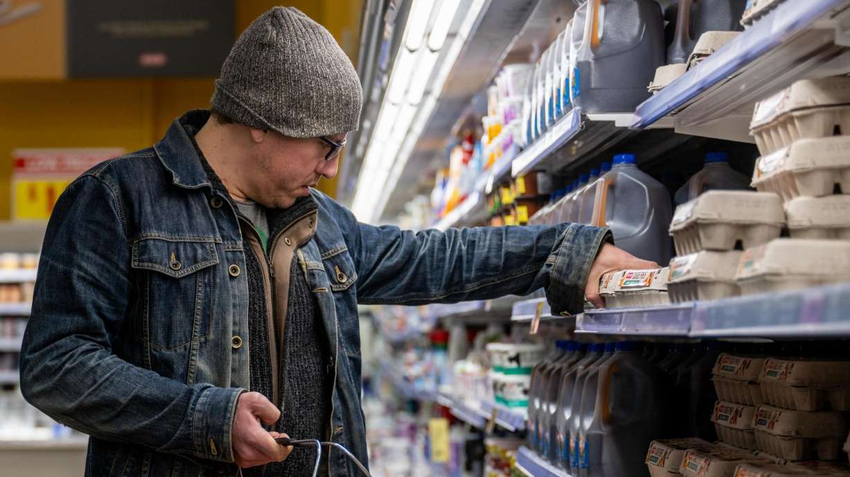 A customer shops for eggs at a H-E-B grocery store on Feb. 8 in Austin, Texas. Egg prices spiked after a deadly avian flu affected supply.