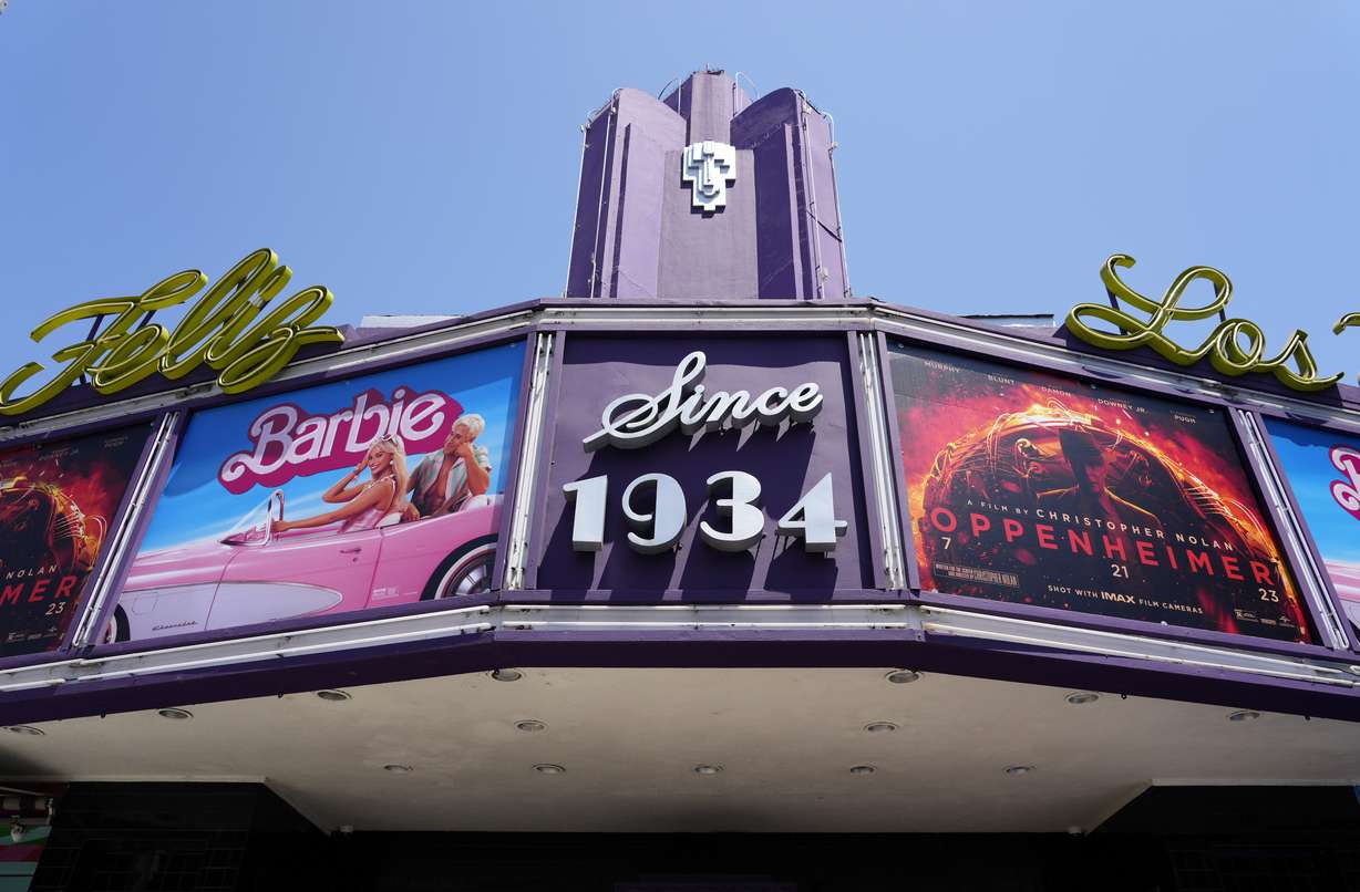 The marquee of the Los Feliz Theatre features the films "Barbie" and "Oppenheimer," on July 28, in Los Angeles. The films both premiered the same weekend.
