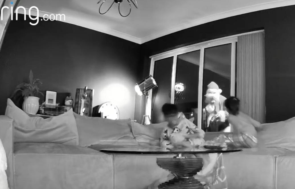 A Ring camera captured a visit from Santa Claus, much to the surprise of two children.