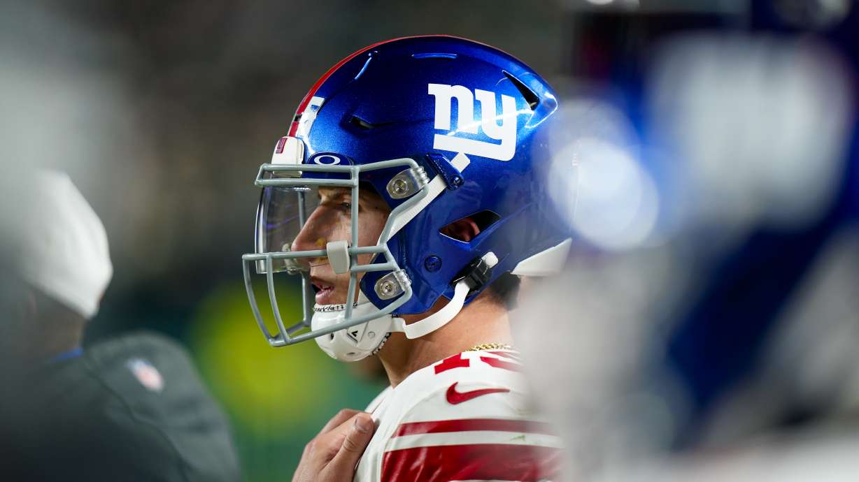 New York Giants quarterback Tommy DeVito watches from the sidelines during the second half of an NFL football game against the Philadelphia Eagles Monday, Dec. 25, 2023, in Philadelphia.