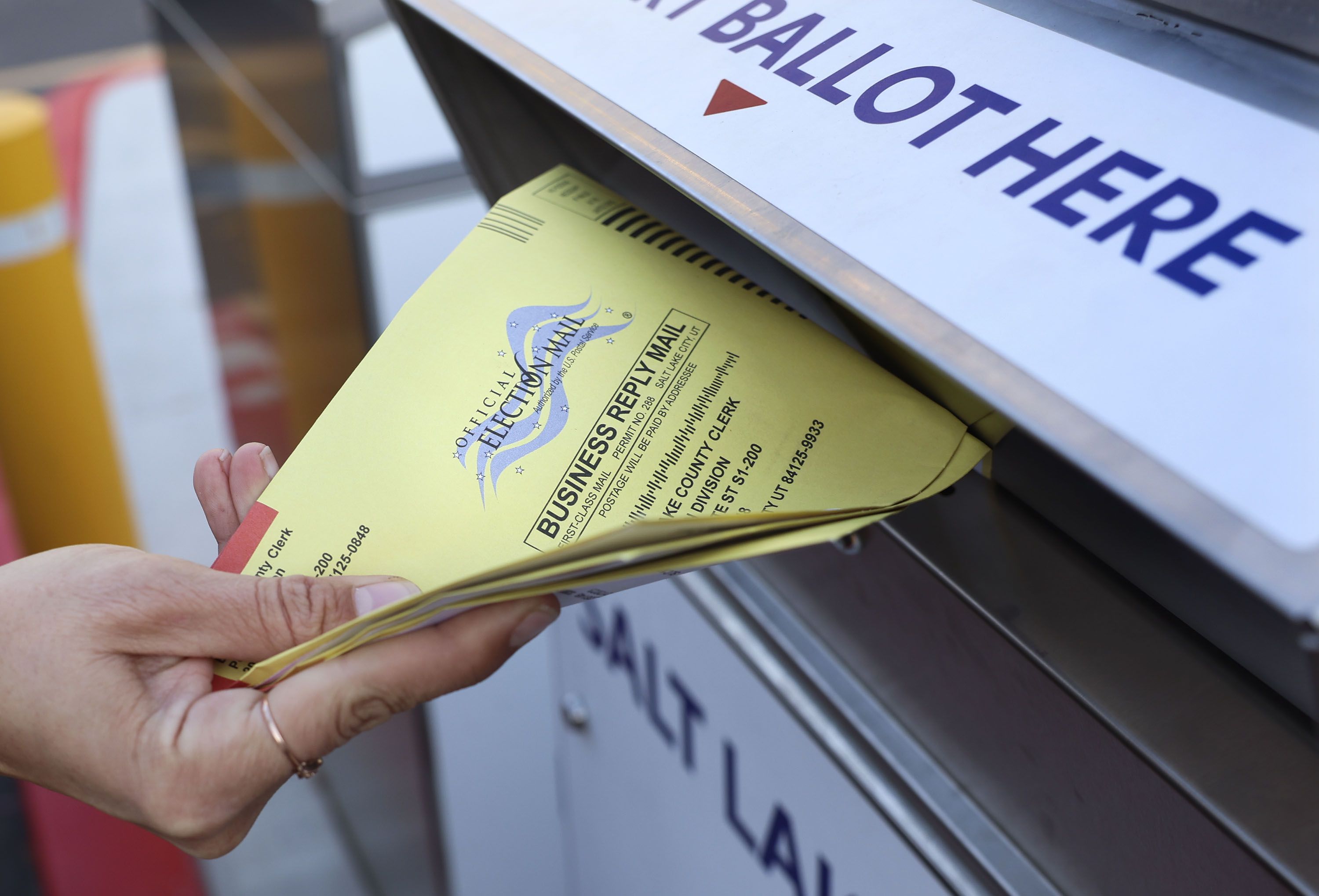 A voter places her ballot into a secure ballot drop box at the Salt Lake County Government Center in Salt Lake City on Nov. 21. The Green Party of Utah announced it will appear on ballots in the state in 2024 and 2026.