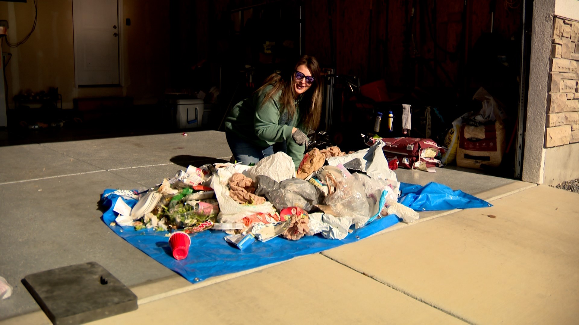 An Eagle Mountain woman, Paige Slaymaker, searched her garbage on Wednesday, for her missing wedding ring.