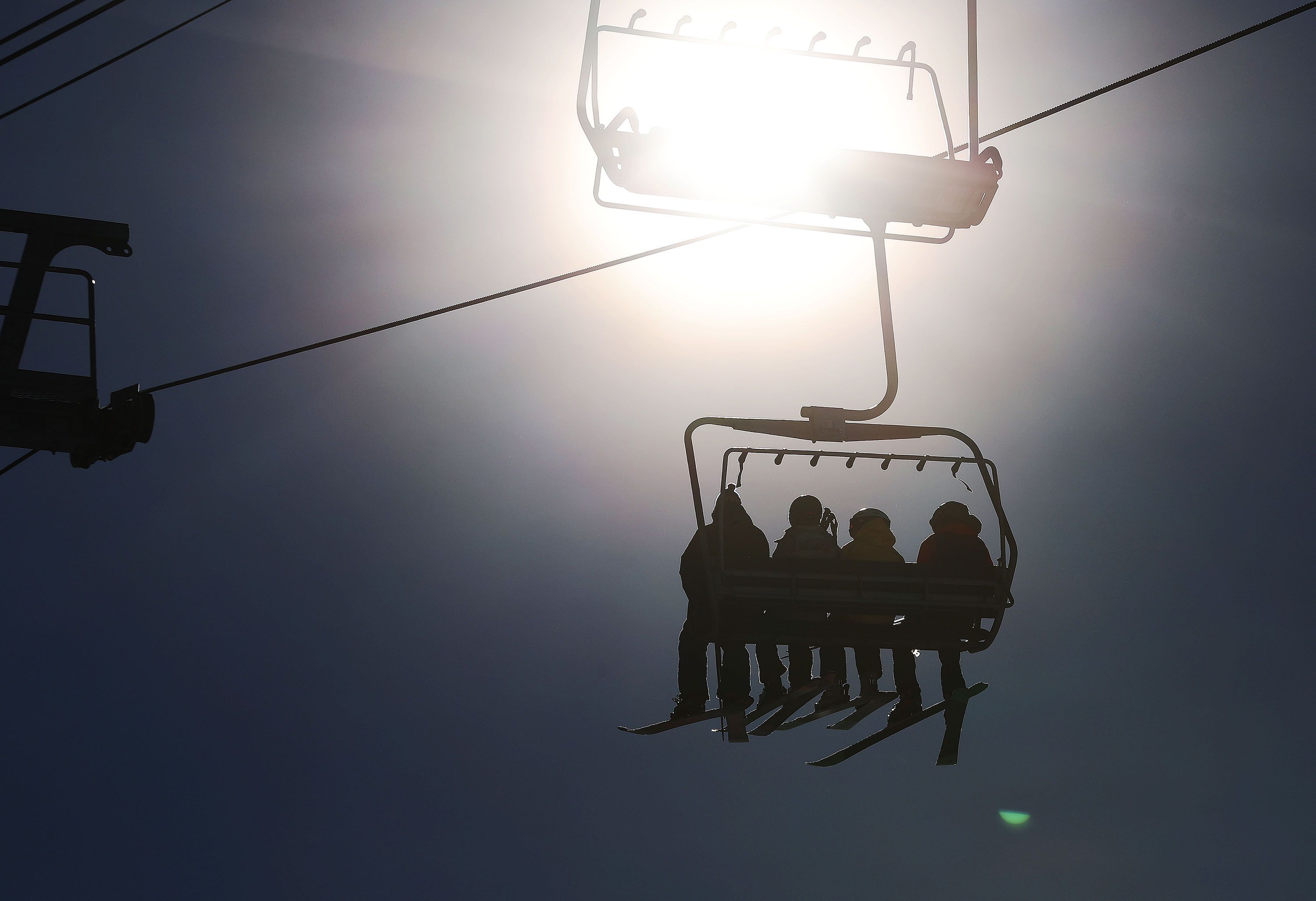 Skiers ride the lift at Alta Ski Resort on Dec. 15. A new report details the economic might of outdoor recreation in Utah, as much as $8.1 billion in economic output.