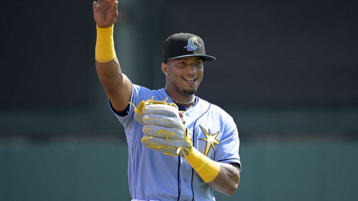 FILE - Tampa Bay Rays' Wander Franco warms up before a spring training baseball game against the New York Yankees, Tuesday, Feb. 28, 2023, in Kissimmee, Fla. Franco gets the 13th-highest bonus at $706,761, in the $50 million pool for pre-arbitration players, according to figures compiled by Major League Baseball and the players’ association.