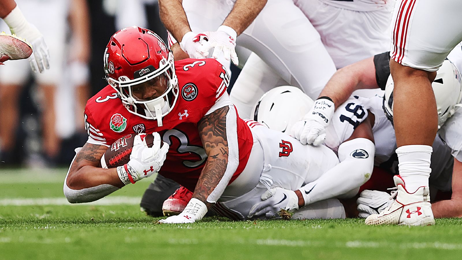 Utah Utes running back Ja'Quinden Jackson (3) dives forward during a run as Utah and Penn State play in the Rose Bowl, in Pasadena California on Monday, Jan. 2, 2023.