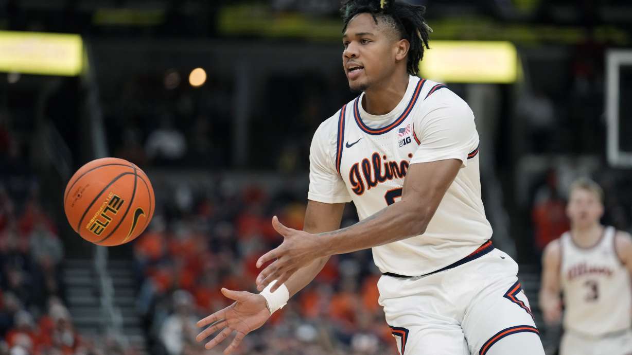 Illinois' Terrence Shannon Jr. passes during the first half of an NCAA college basketball game against Missouri Friday, Dec. 22, 2023, in St. Louis.
