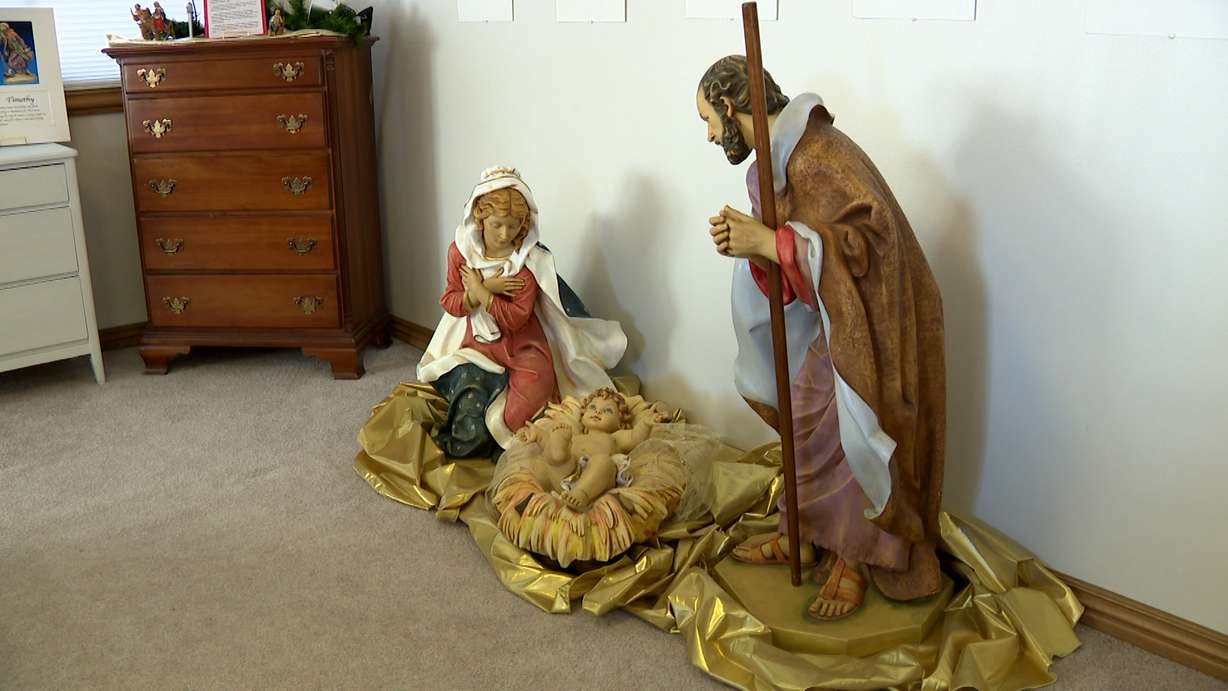 Holly and Jack Zenger hate to put Christmas away because it means putting their many nativity scenes away too, shown here on Thursday.