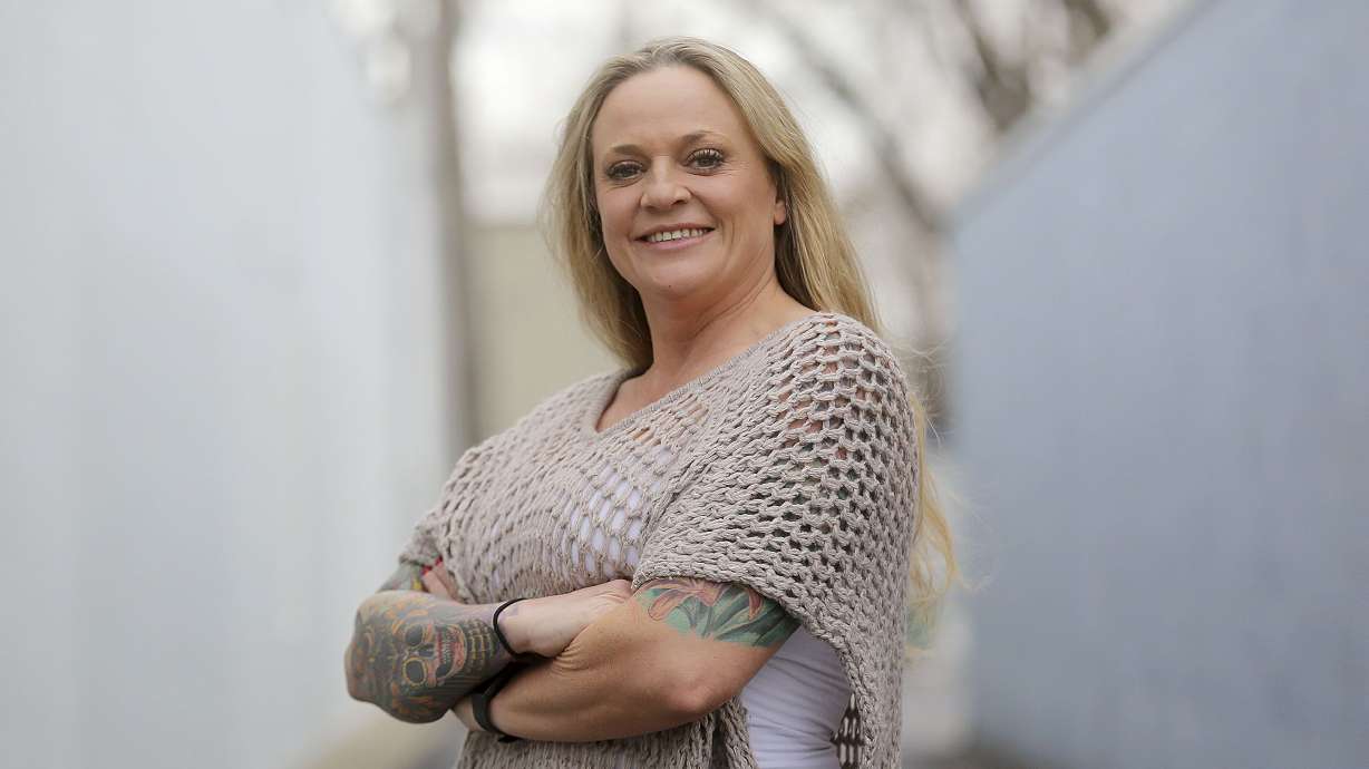 Mindy Vincent poses in South Salt Lake on Dec. 17, 2020. Vincent, a recovering drug addict and now a licensed clinical social worker who has turned her life around, is suing the government to restore her right to own a gun.