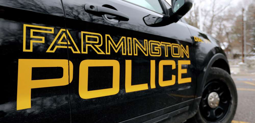 Farmington police officer found justified in killing gunman beating, threatening wife