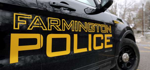 Farmington police officer found justified in killing gunman beating, threatening wife
