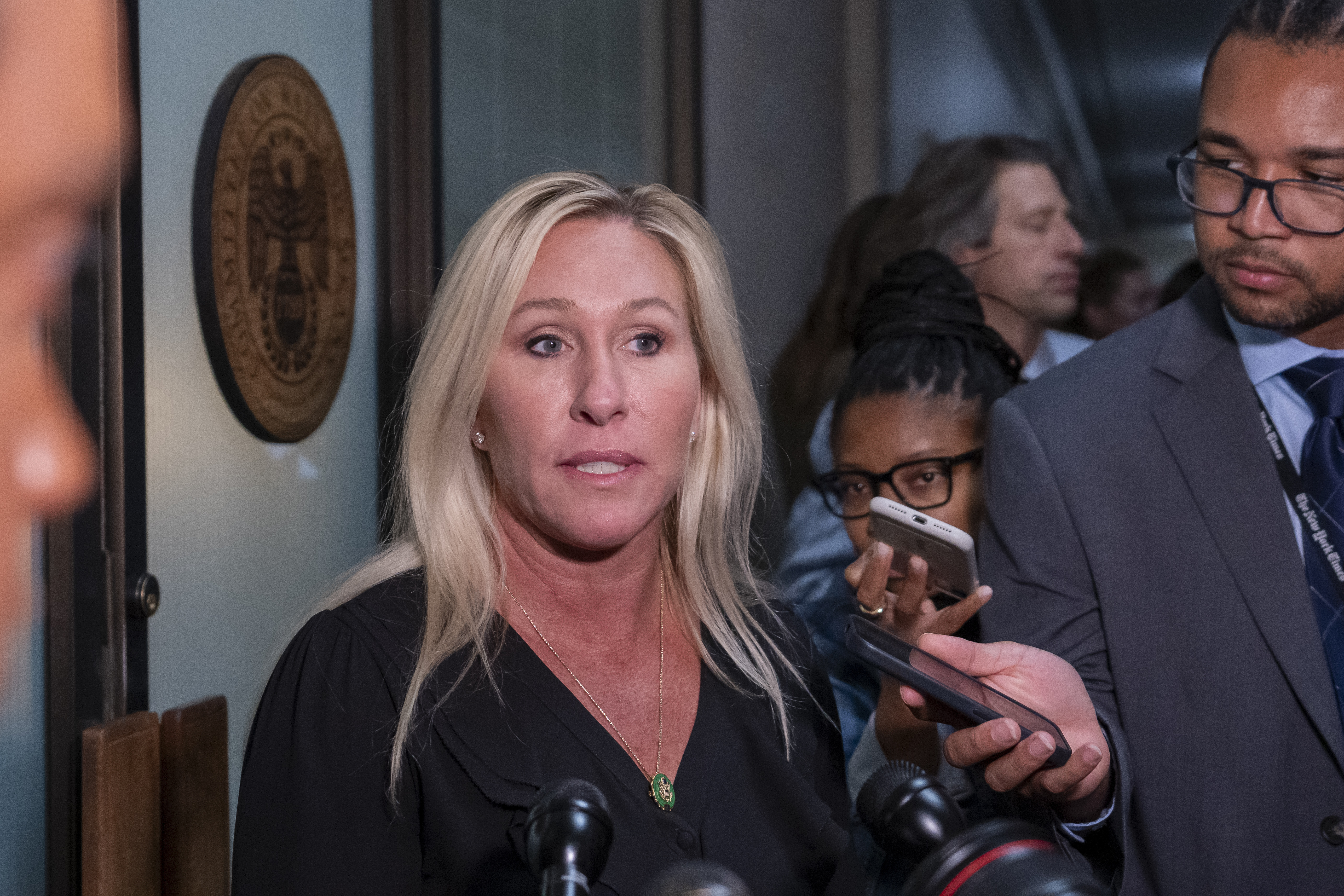 Rep. Marjorie Taylor-Greene, R-Ga., arrives on Capitol Hill in Washington, Oct. 24. A spate of false reports of shootings at the homes of public officials in recent days could be setting the stage for stricter penalties against so-called swatting.