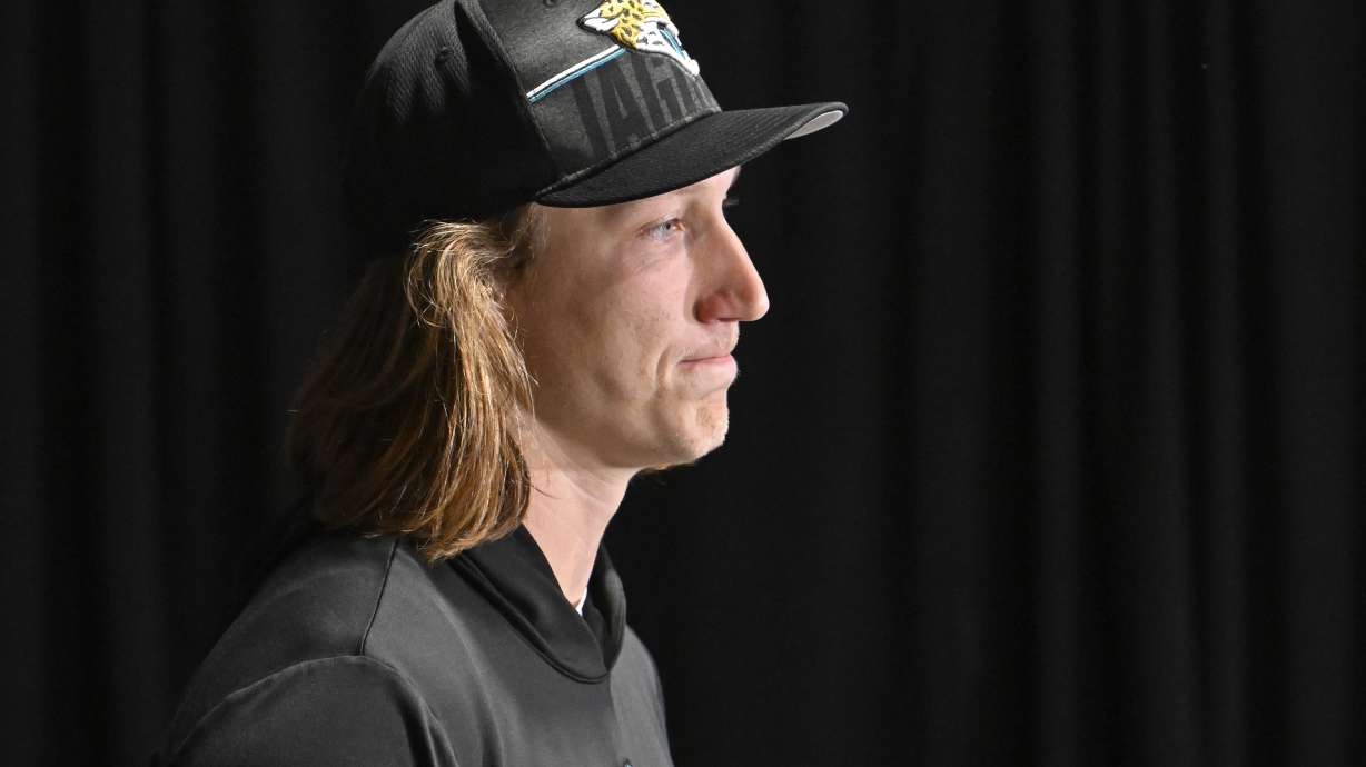 Jacksonville Jaguars quarterback Trevor Lawrence answers questions during a news conference an NFL football game Sunday, Dec. 24, 2023, in Tampa, Fla.