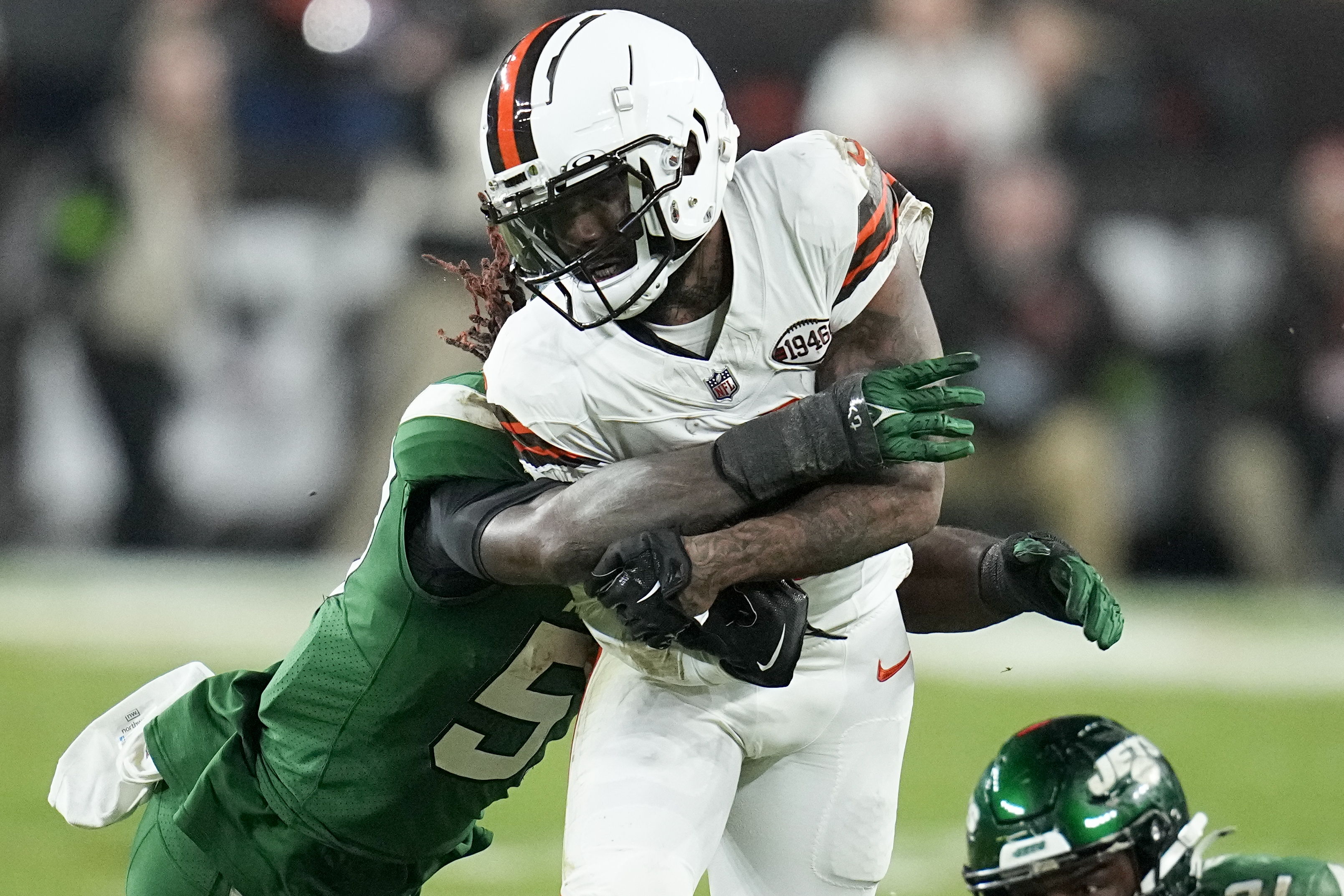 Cleveland Browns wide receiver Elijah Moore is injured on a play after getting is tackled by New York Jets linebacker C.J. Mosley during the first half of an NFL football game Thursday, Dec. 28, 2023, in Cleveland.