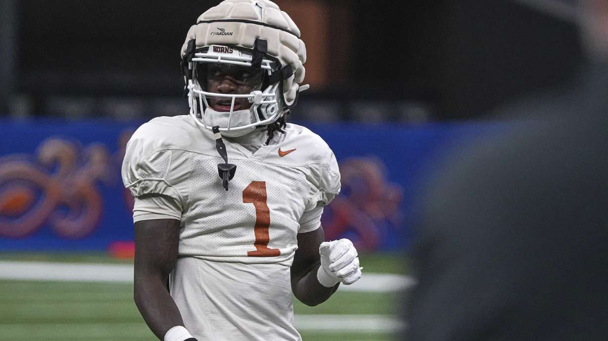 Texas wide receiver Xavier Worthy (1) walks the field during practice at the Superdome ahead of the Sugar Bowl in New Orleans, Thursday, Dec. 28, 2023. Texas will take on the Washington in the Sugar Bowl on Monday, Jan. 1, 2024.