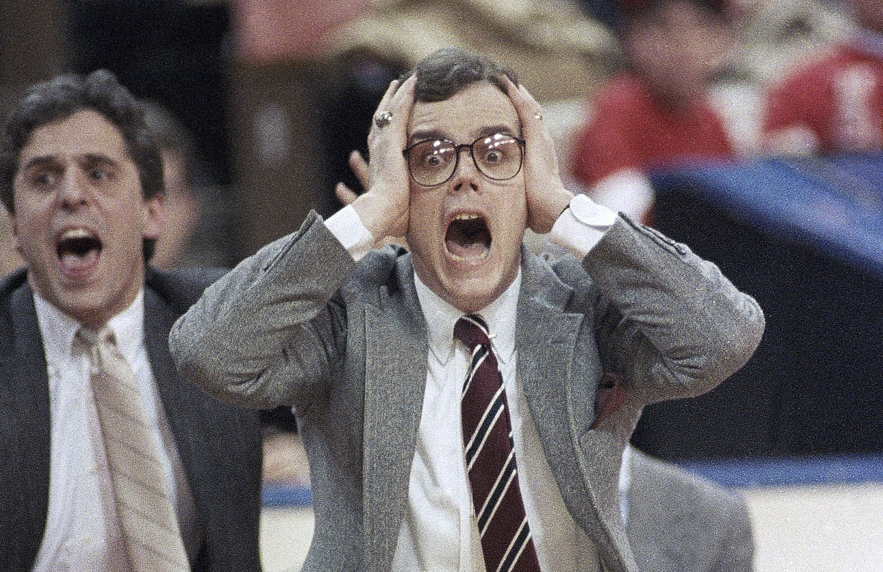 FILE - DePaul coach Joey Meyer reacts to his team's play against LSU in an NCAA men's college basketball tournament Midwest Regional semifinal in Cincinnati, March 20, 1987. Meyer, who played at DePaul and coached the Blue Demons to seven NCAA Tournament appearances in 13 seasons, has died. He was 74. Meyer died Friday, Dec. 29, 2023, in the Chicago suburb of Hinsdale, surrounded by family, DePaul said in a release. The school did not provide any further information. 