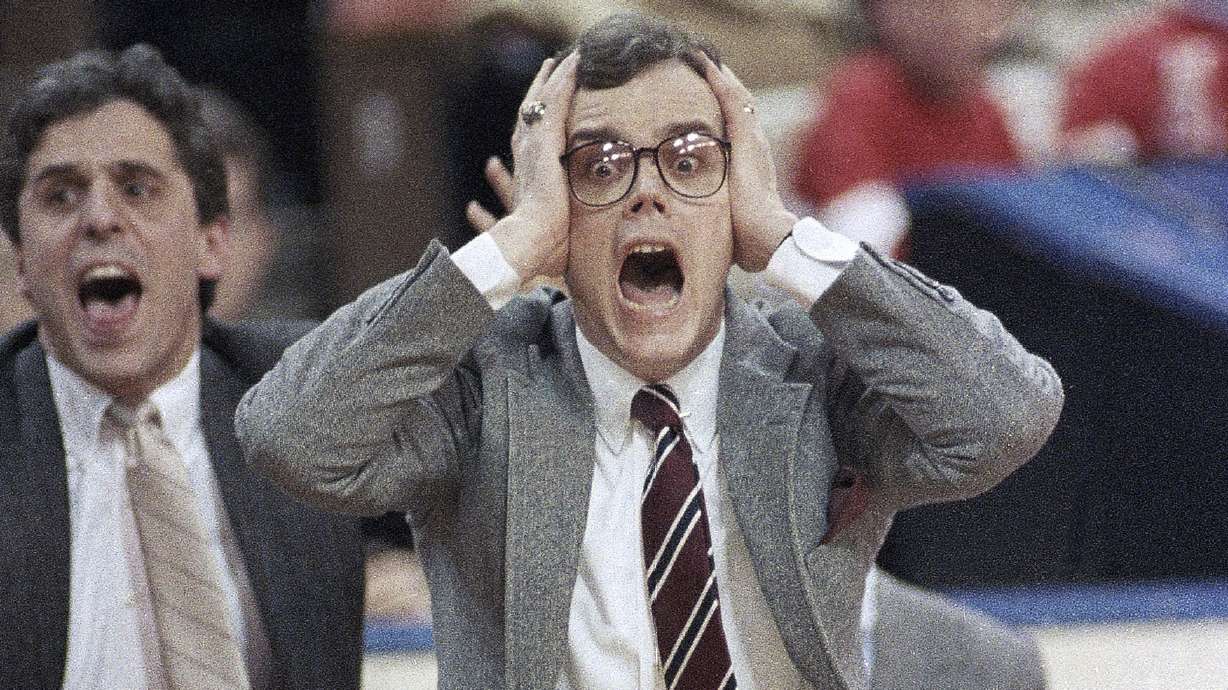 FILE - DePaul coach Joey Meyer reacts to his team's play against LSU in an NCAA men's college basketball tournament Midwest Regional semifinal in Cincinnati, March 20, 1987. Meyer, who played at DePaul and coached the Blue Demons to seven NCAA Tournament appearances in 13 seasons, has died. He was 74. Meyer died Friday, Dec. 29, 2023, in the Chicago suburb of Hinsdale, surrounded by family, DePaul said in a release. The school did not provide any further information.