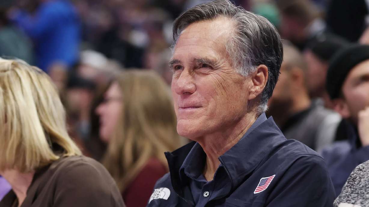 Sen. Mitt Romney watches a Utah Jazz game in Salt Lake City on Monday, Dec. 18.