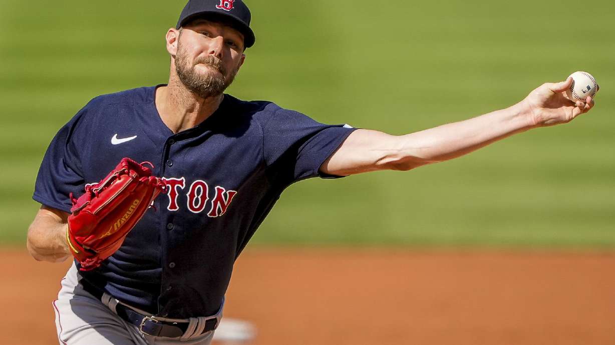 FILE -Boston Red Sox starting pitcher Chris Sale pitches during the first inning of a baseball game against the Washington Nationals at Nationals Park, Thursday, Aug. 17, 2023, in Washington. Chris Sale's injury-filled career with the Boston Red Sox ended Saturday, Dec. 30, 2023 when the 34-year-old left-hander was traded the Atlanta Braves for infielder Vaughn Grissom.