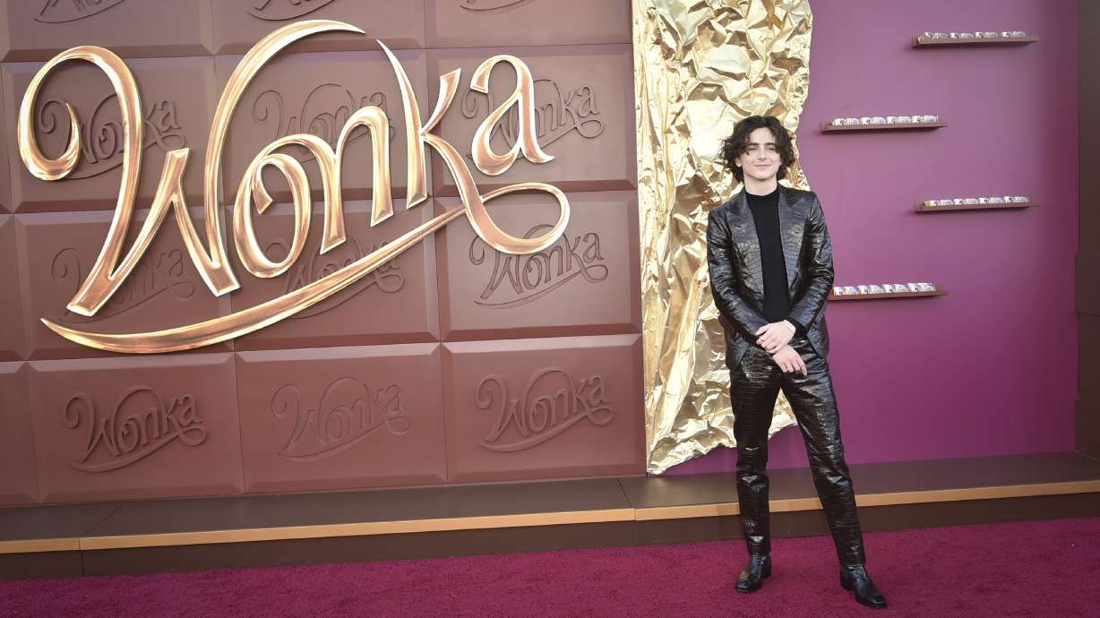 Timothee Chalamet arrives at the premiere of "Wonka" on Dec. 10, at Regency Village Theatre in Westwood, Calif. Hollywood closed out an up-and-down 2023 with "Wonka" regaining No. 1 at the box office, strong sales for "The Color Purple" and an overall $9 billion in ticket sales that improved on 2022's grosses but fell about $2 billion shy of pre-pandemic norms.
