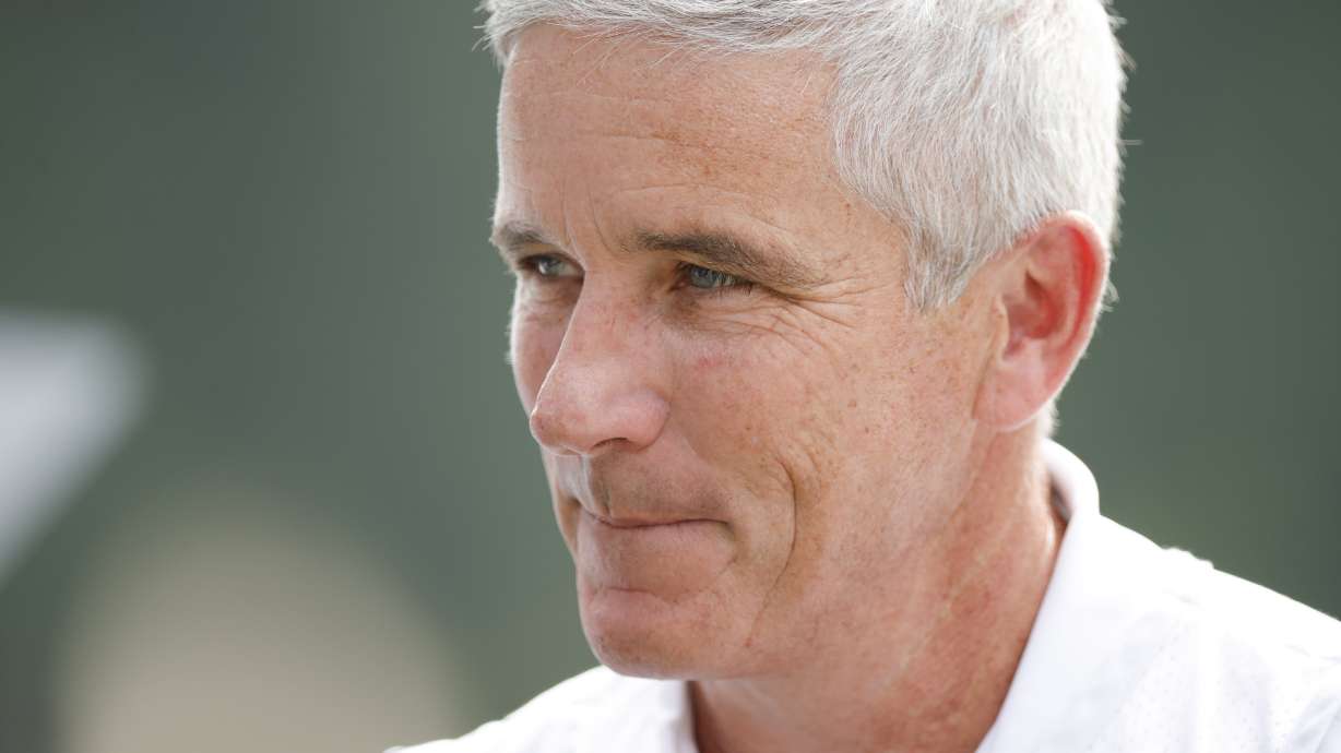 FILE - PGA Commissioner Jay Monahan on the first tee box during the first round of the Tour Championship golf tournament at East Lake Golf Club, Thursday, Aug. 24, 2023, in Atlanta. Monahan's 2023 is best remembered for secretly negotiating a business agreement with the Saudi-backers of rival LIV Golf.