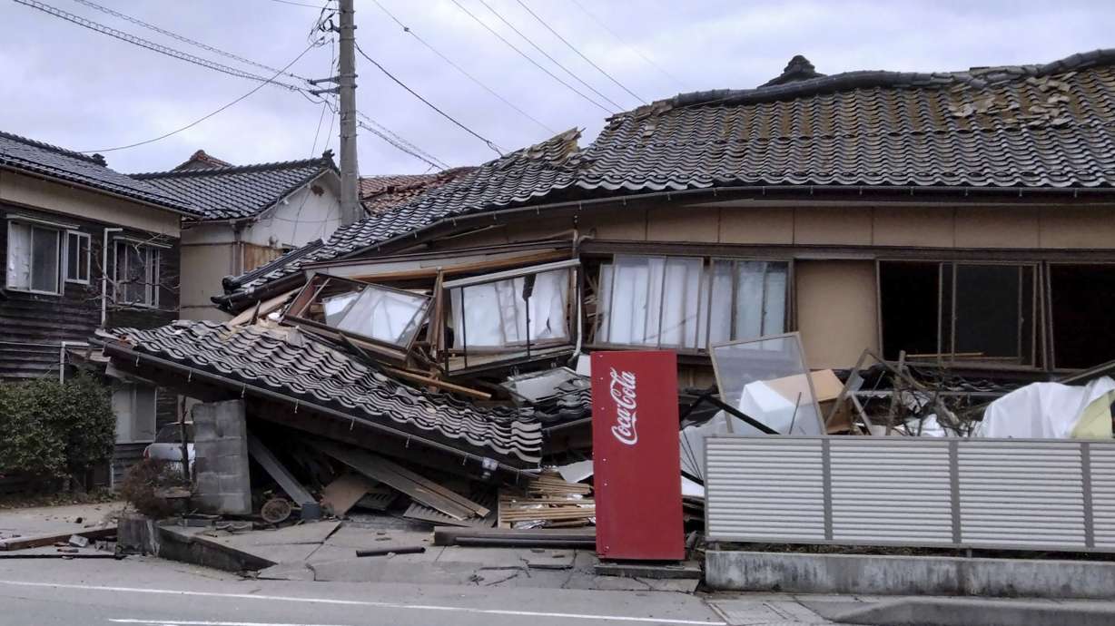 A house is damaged by an earthquake in Wajima, Ishikawa prefecture, Japan on Monday. Japan issued tsunami alerts Monday after a series of strong quakes in the Sea of Japan.