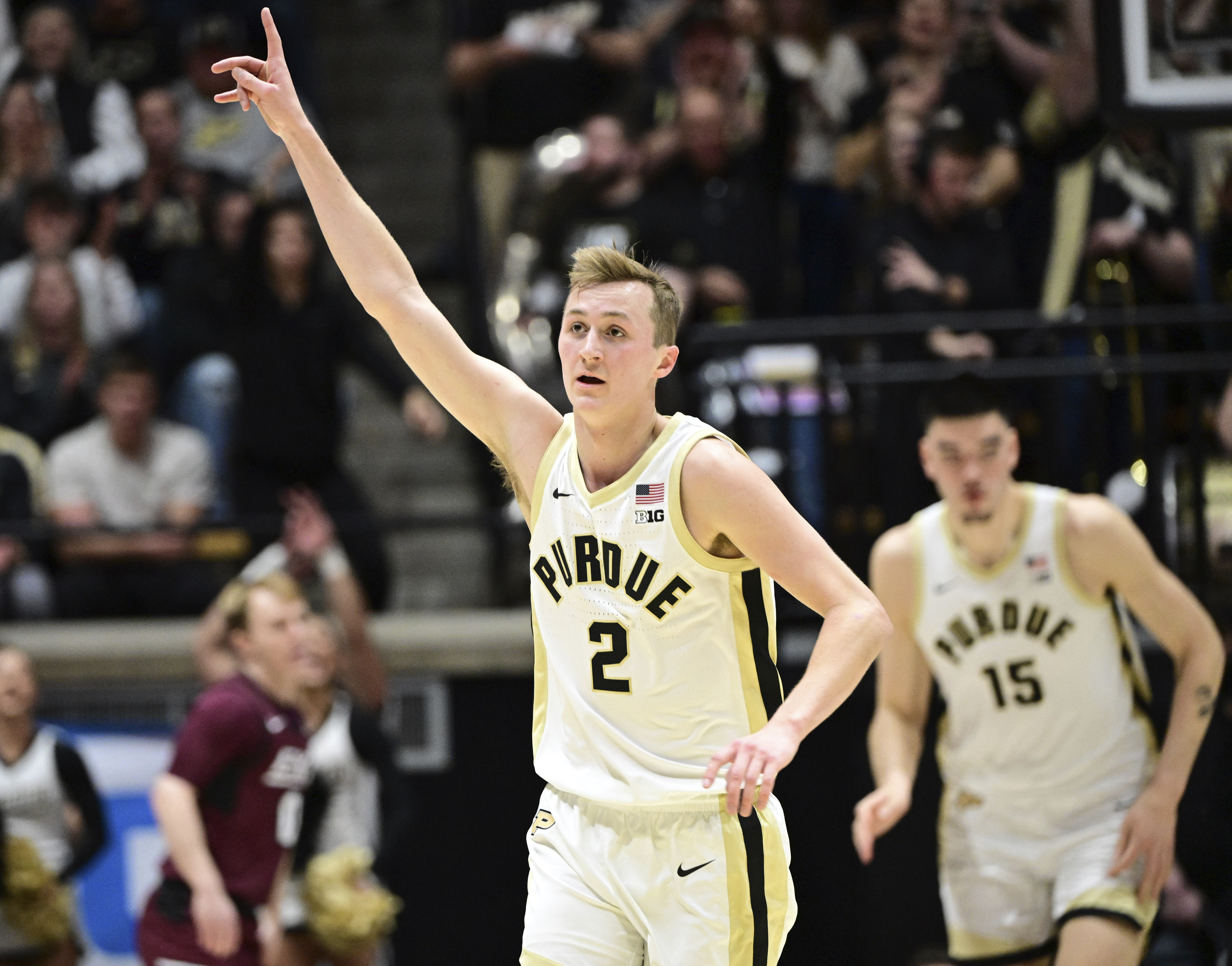 Purdue guard Fletcher Loyer (2) celebrates a 3-pointer during the first half of the team's NCAA college basketball game against Eastern Kentucky, Friday, Dec. 29, 2023, in West Lafayette, Ind.