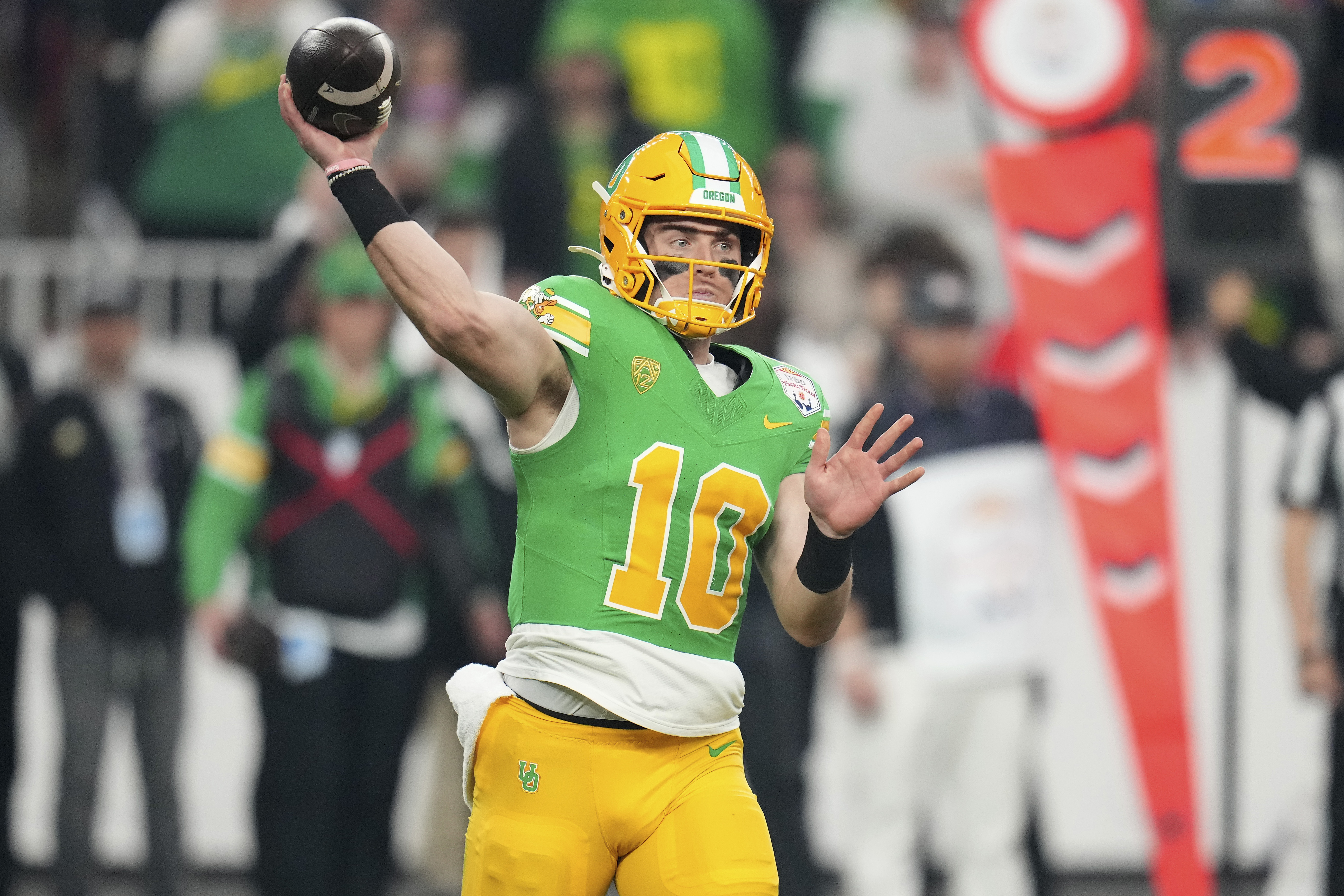 Oregon quarterback Bo Nix (10) throws against Liberty during the first half on the NCAA Fiesta Bowl college football game, Monday, Jan. 1, 2024, in Glendale, Ariz.