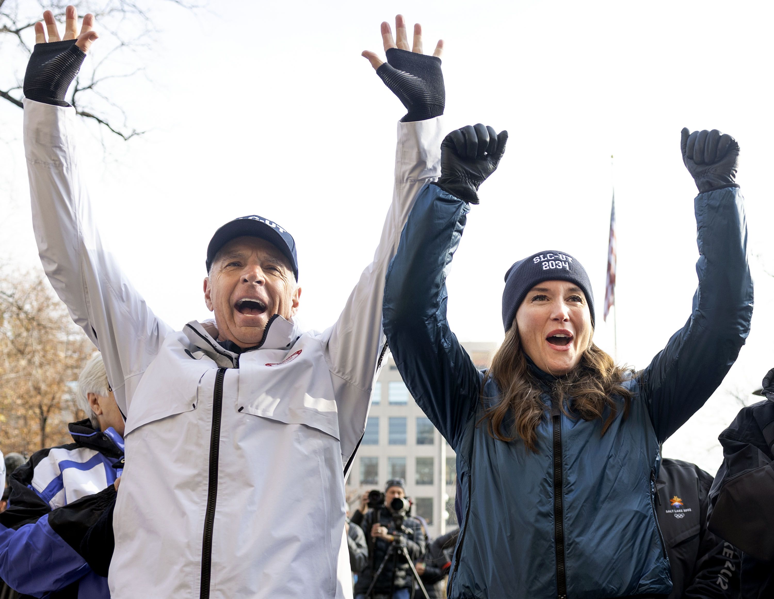 Fraser Bullock, president and CEO of the Salt Lake City-Utah Committee for the Games, and Salt Lake City Mayor Erin Mendenhall cheer as Salt Lake City is named the preferred host for the 2034 Olympics during a “watch party” at the Salt Lake City and County Building in Salt Lake City on Nov. 29, 2023.