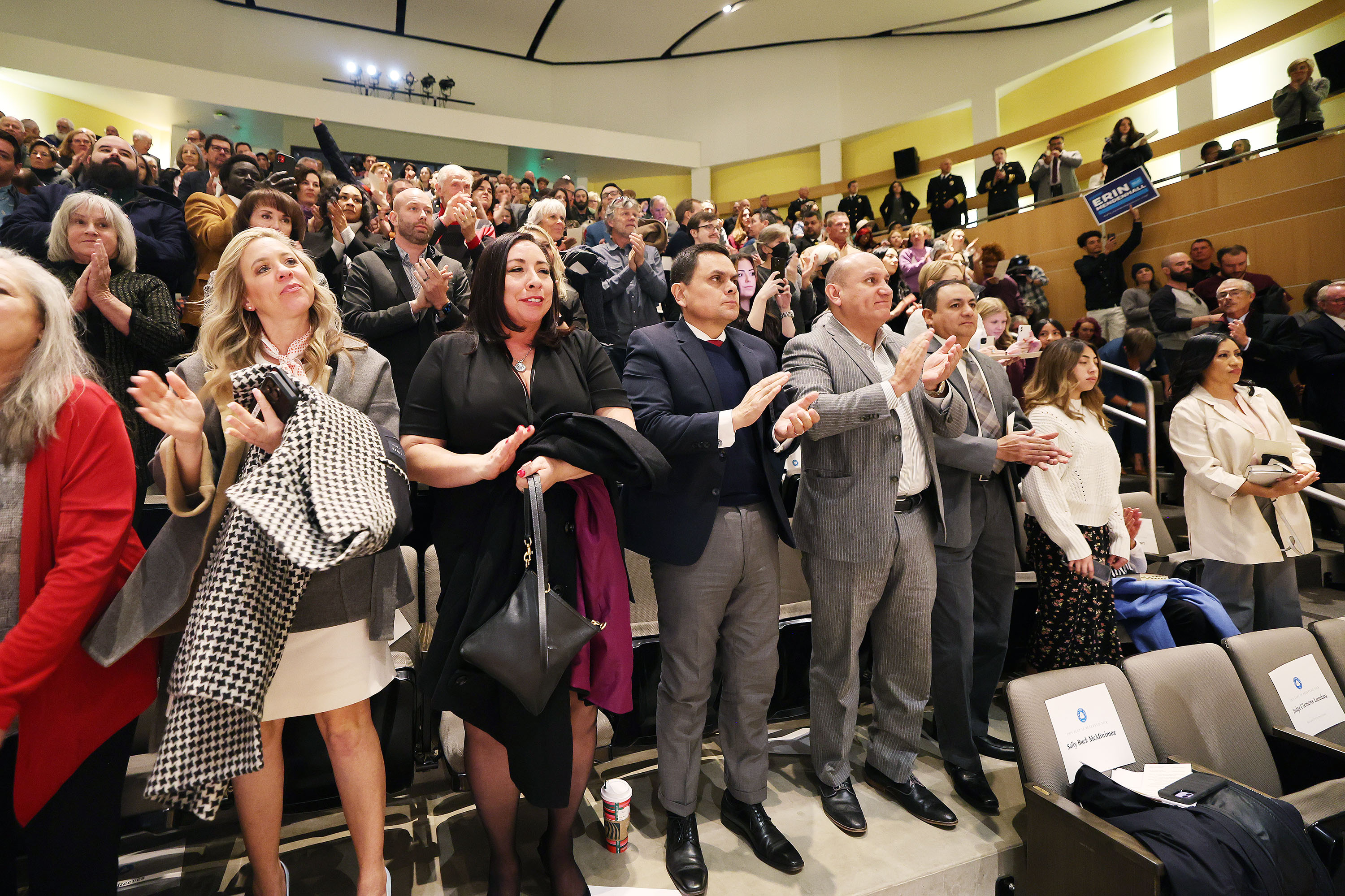 Attendees applaud after Salt Lake City Mayor Erin Mendenhall spoke during her inauguration in Salt Lake City on Tuesday.