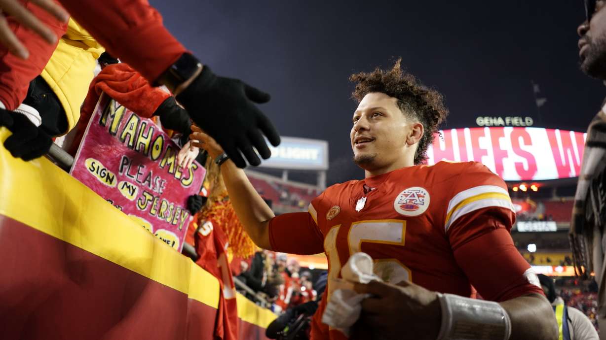 Kansas City Chiefs quarterback Patrick Mahomes celebrates following an NFL football game against the Cincinnati Bengals Sunday, Dec. 31, 2023, in Kansas City, Mo. The Chiefs won 25-17 to clinch the AFC West.