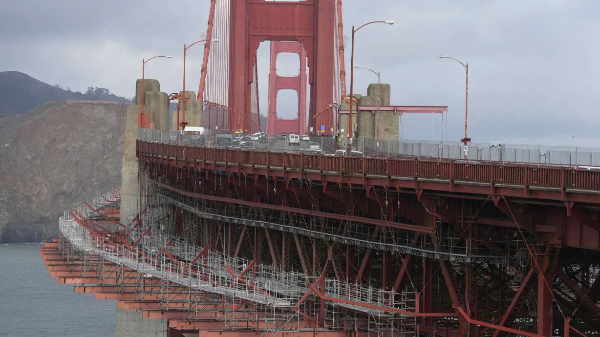 A suicide deterrent net is seen under construction on the Golden Gate Bridge in San Francisco, Dec. 6, 2023. The barrier at the bridge is near completion more than a decade after officials approved it.