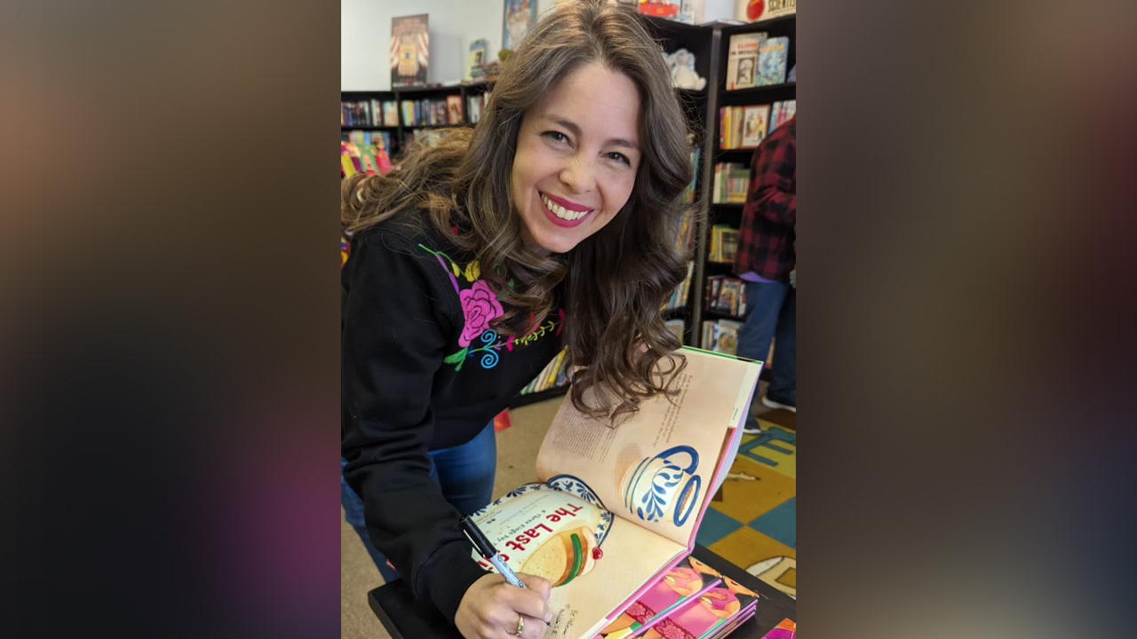 Melissa Seron Richardson, author of "The Last Slice," a book about Día de los Reyes, on Dec. 9, 2023, at the Printed Garden bookstore in Sandy. Día de los Reyes is a tradition commonly celebrated by Mexicans and those of Mexican descent.