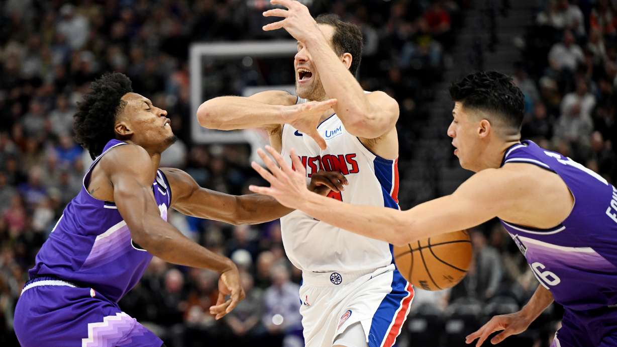 Utah Jazz guard Collin Sexton (2) and Utah Jazz forward Simone Fontecchio (16) defend Detroit Pistons forward Bojan Bogdanovic (44) as the Utah Jazz and Detroit Pistons play at the Delta Center in Salt Lake City on Wednesday, Jan. 3, 2024.