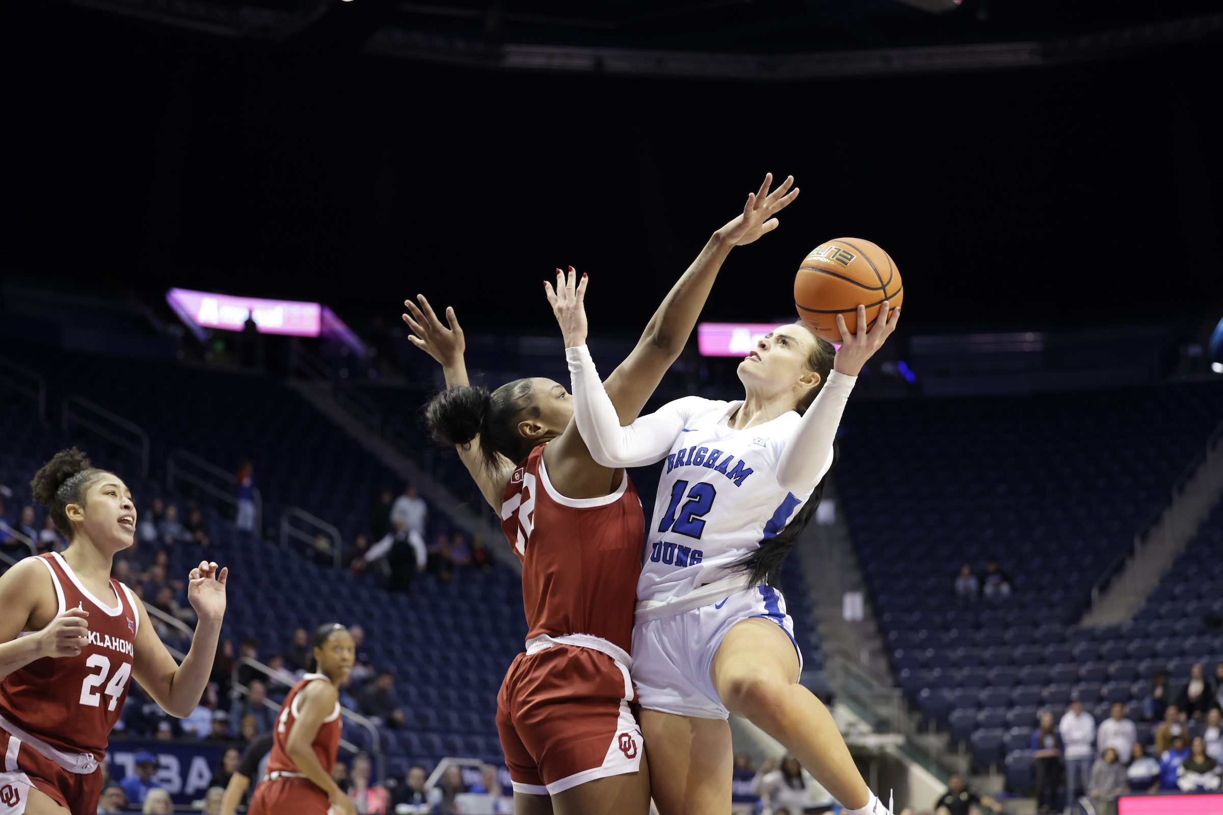 BYU forward Lauren Gustin goes up for a shot against Oklahoma, Wednesday, Jan. 3, 2024, in the Marriott in Provo. The Sooners won, 75-63.