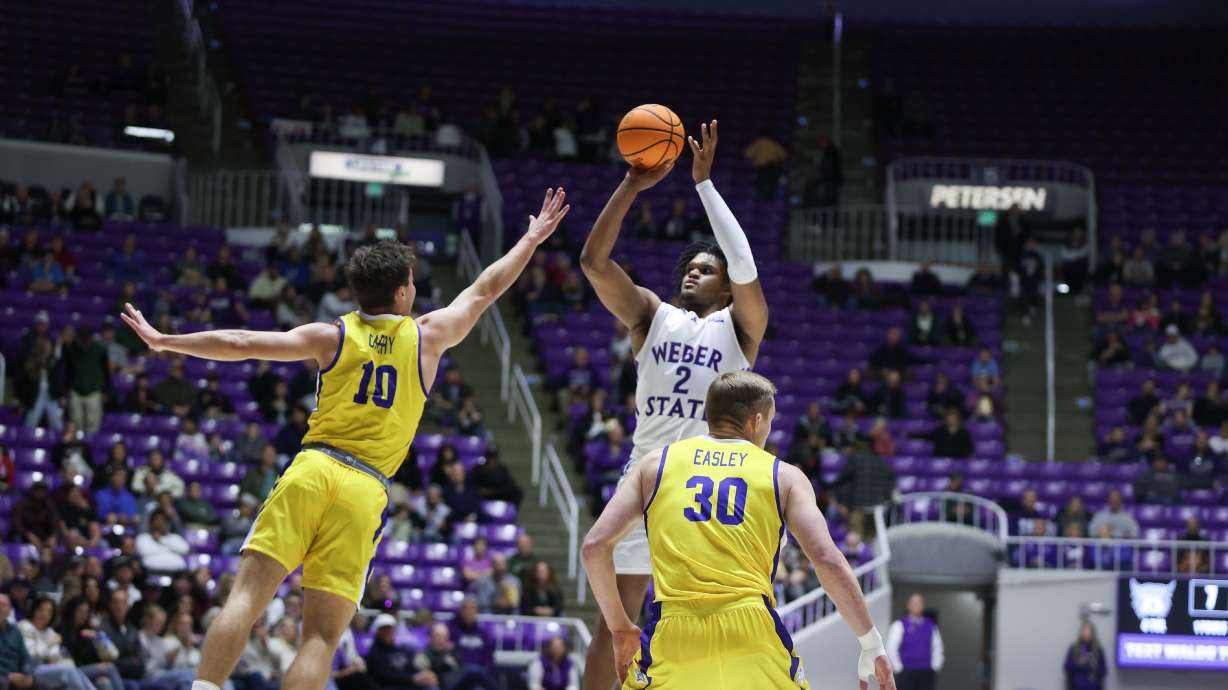 Weber State's Dillon Jones shoots over a defender during the Wildcats' NCAA men's basketball game against South Dakota State, Wednesday, Jan. 3, 2024 at the Dee Events Center in Ogden.