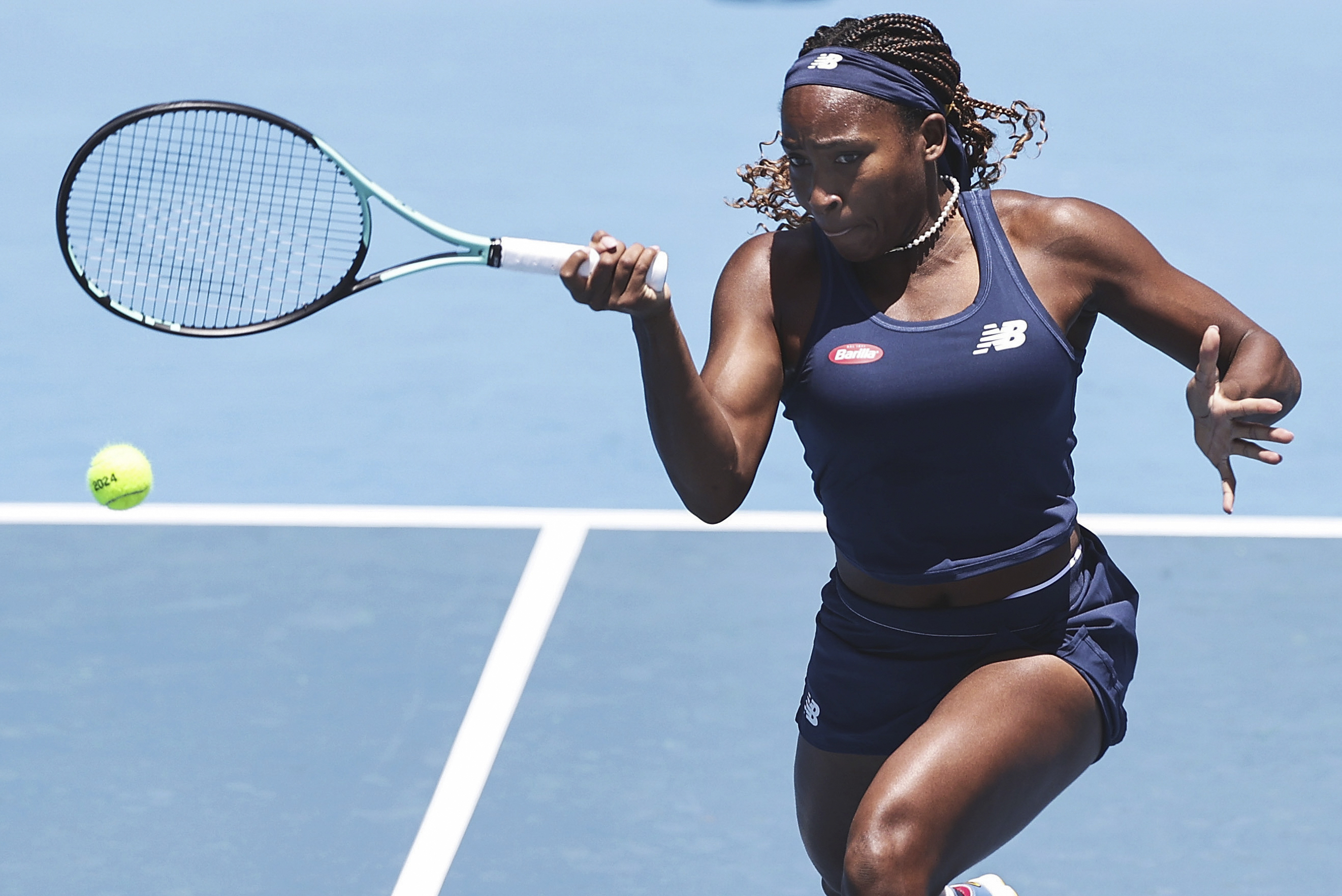 Coco Gauff of United States plays a forehand return to Brenda Fruhvirtova of Czech Republic at the ASB Tennis Classic in Auckland, New Zealand, Thursday, Jan. 4, 2024. 