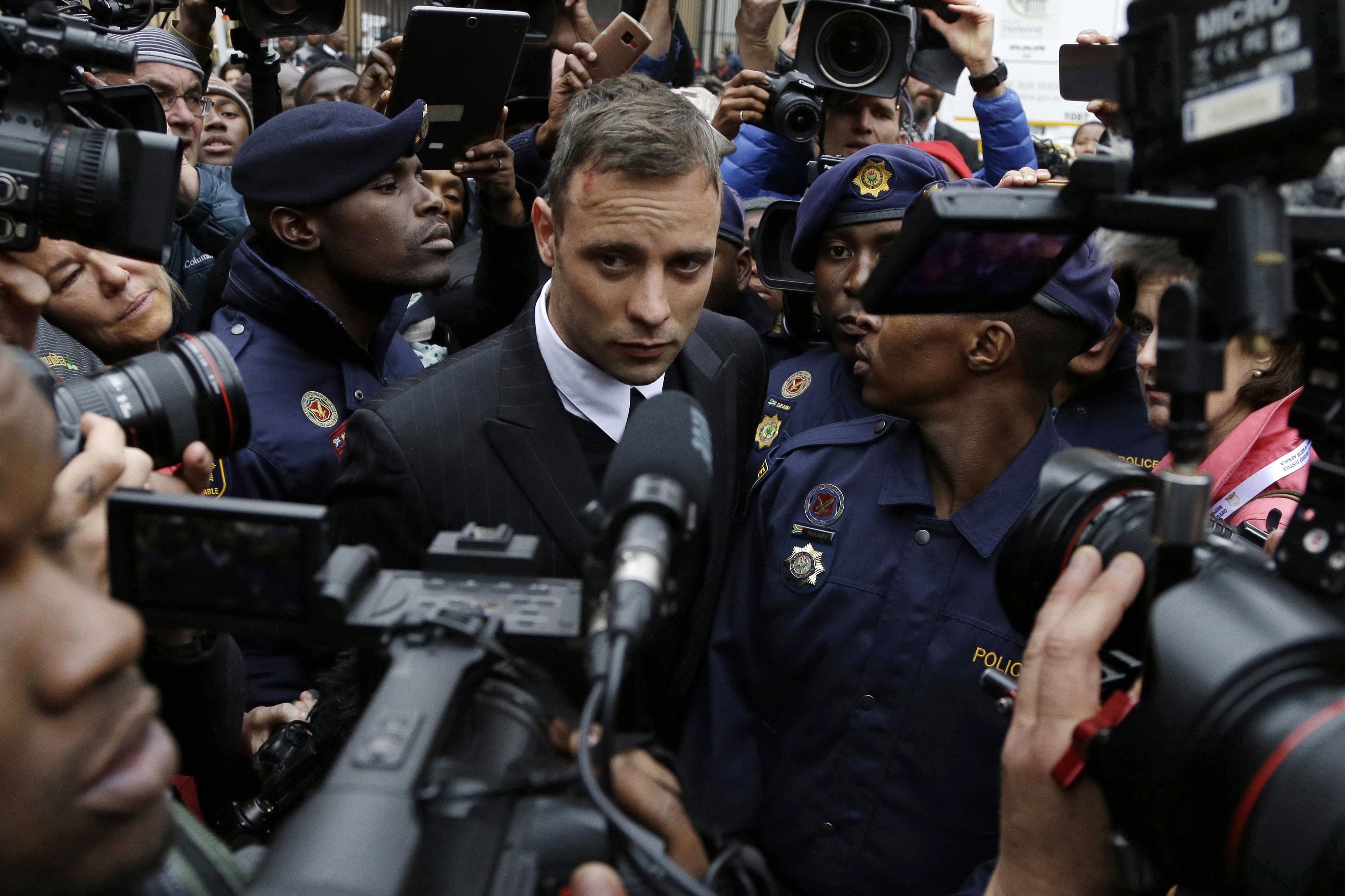 FILE - Oscar Pistorius leaves the High Court in Pretoria, South Africa, on June 14, 2016 during his trail for the murder of girlfriend Reeva Steenkamp. Oscar Pistorius is due on Friday, Jan. 5, 2024 to be released from prison on parole to live under strict conditions at a family home after serving nearly nine years of his murder sentence for the shooting death of girlfriend Reeva Steenkamp on Valentine’s Day 2013. 