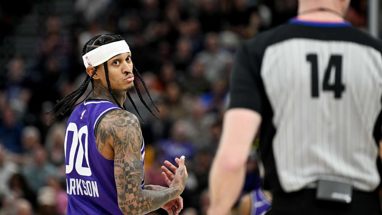 Utah Jazz guard Jordan Clarkson (00) questions referee Ed Malloy (14) after seeing a replay of a foul call as the Utah Jazz and Detroit Pistons play at the Delta Center in Salt Lake City on Wednesday, Jan. 3, 2024. Jazz won 154-148.