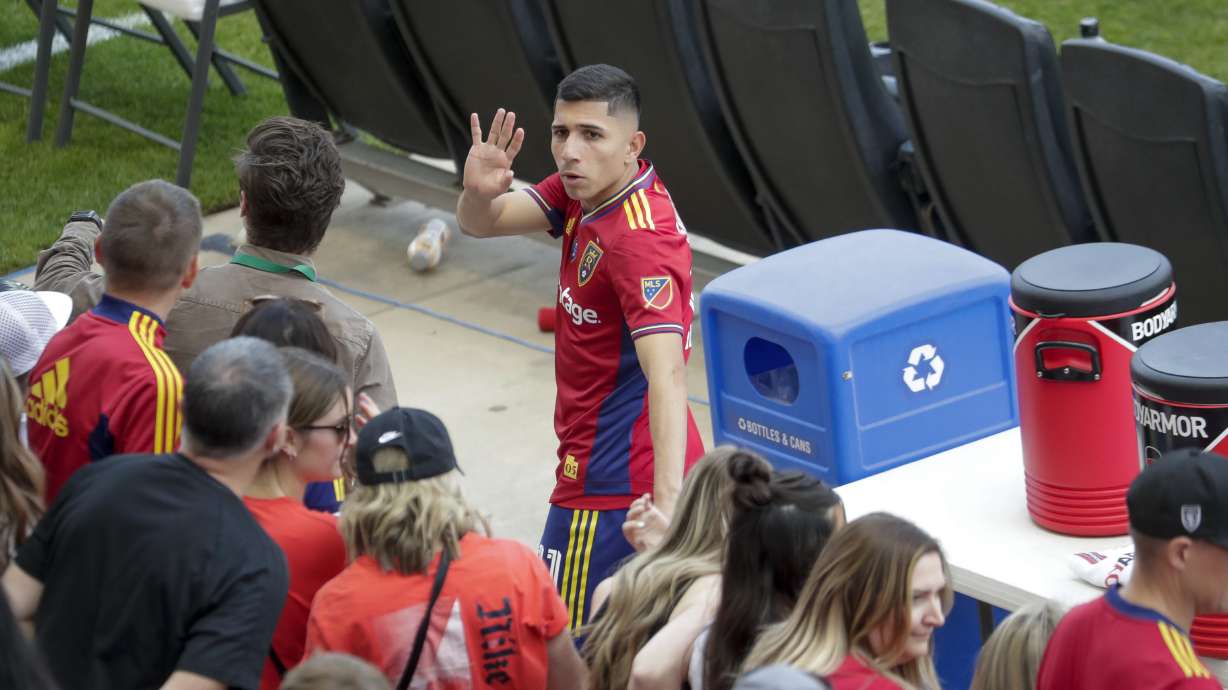 Real Salt Lake's Justin Savarino (11) waves at fans while they celebrate RSL's 3-1 win over the Portland Timbers in Sandy on Sunday, Oct. 9, 2022.