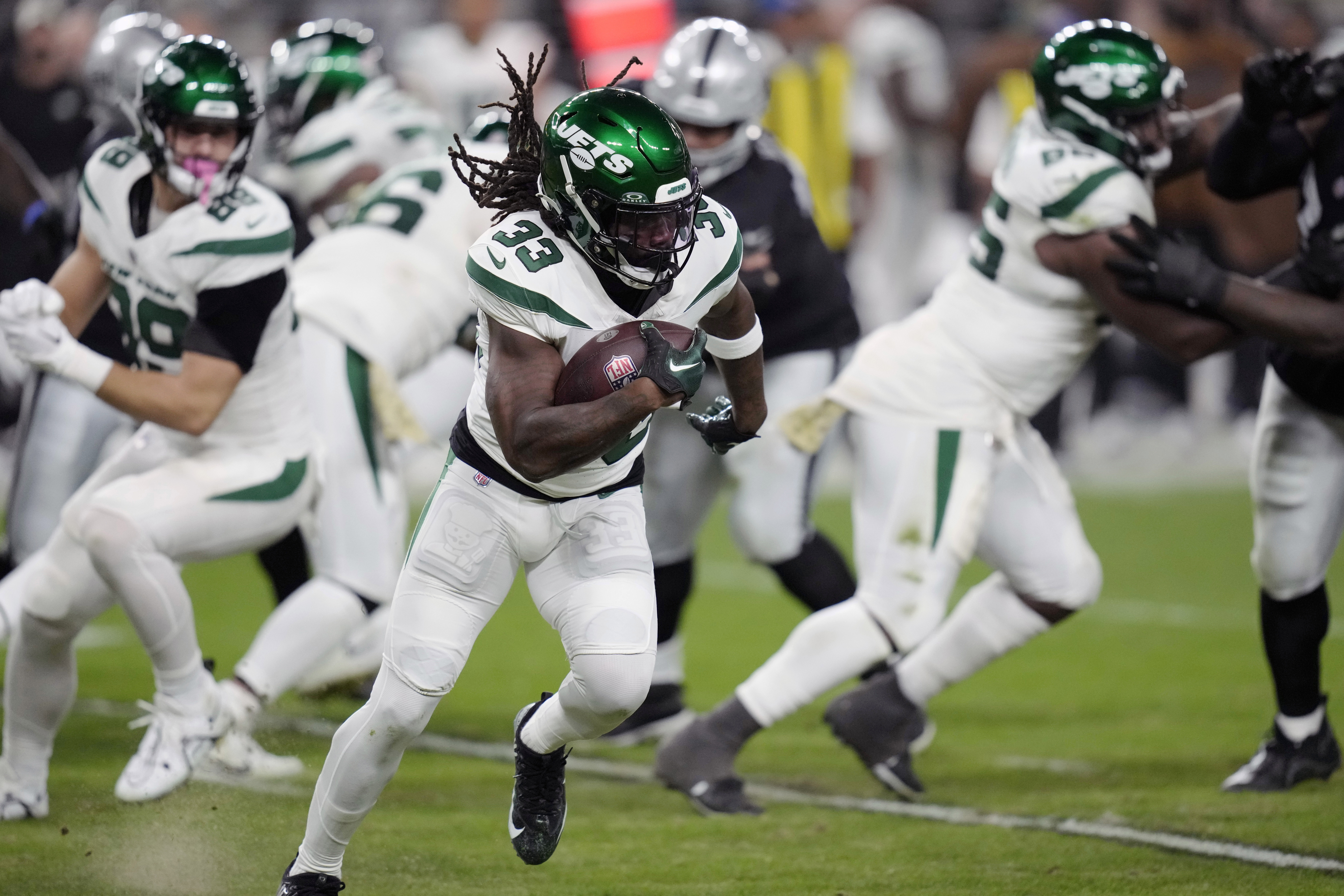 FILE - New York Jets running back Dalvin Cook carries against the Las Vegas Raiders during the first half of an NFL football game Nov. 12, 2023, in Las Vegas. Cook is joining the Baltimore Ravens for a playoff run two days after being waived by the Jets. The move, confirmed by Cook’s agents LAA Sports & Entertainment to The Associated Press on Thursday, Jan. 4, came after Cook cleared waivers and became a free agent. 