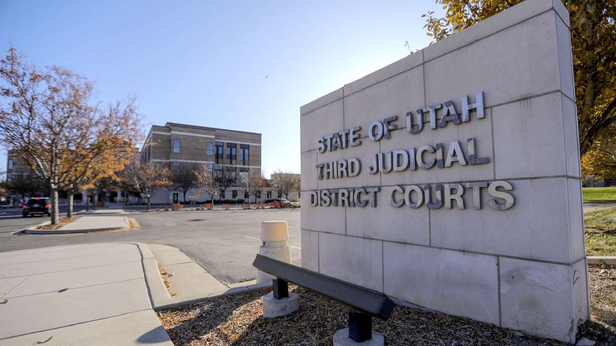 A Millcreek man was charged Friday with barricading the entrances of his home with devices made to look like homemade bombs in an attempt to avoid being evicted.