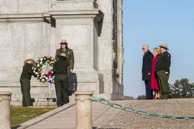 President Joe Biden and first lady Jill Biden attend a memorial wreath ceremony at Valley Forge National Arch, in Valley Forge, Penn., Friday.