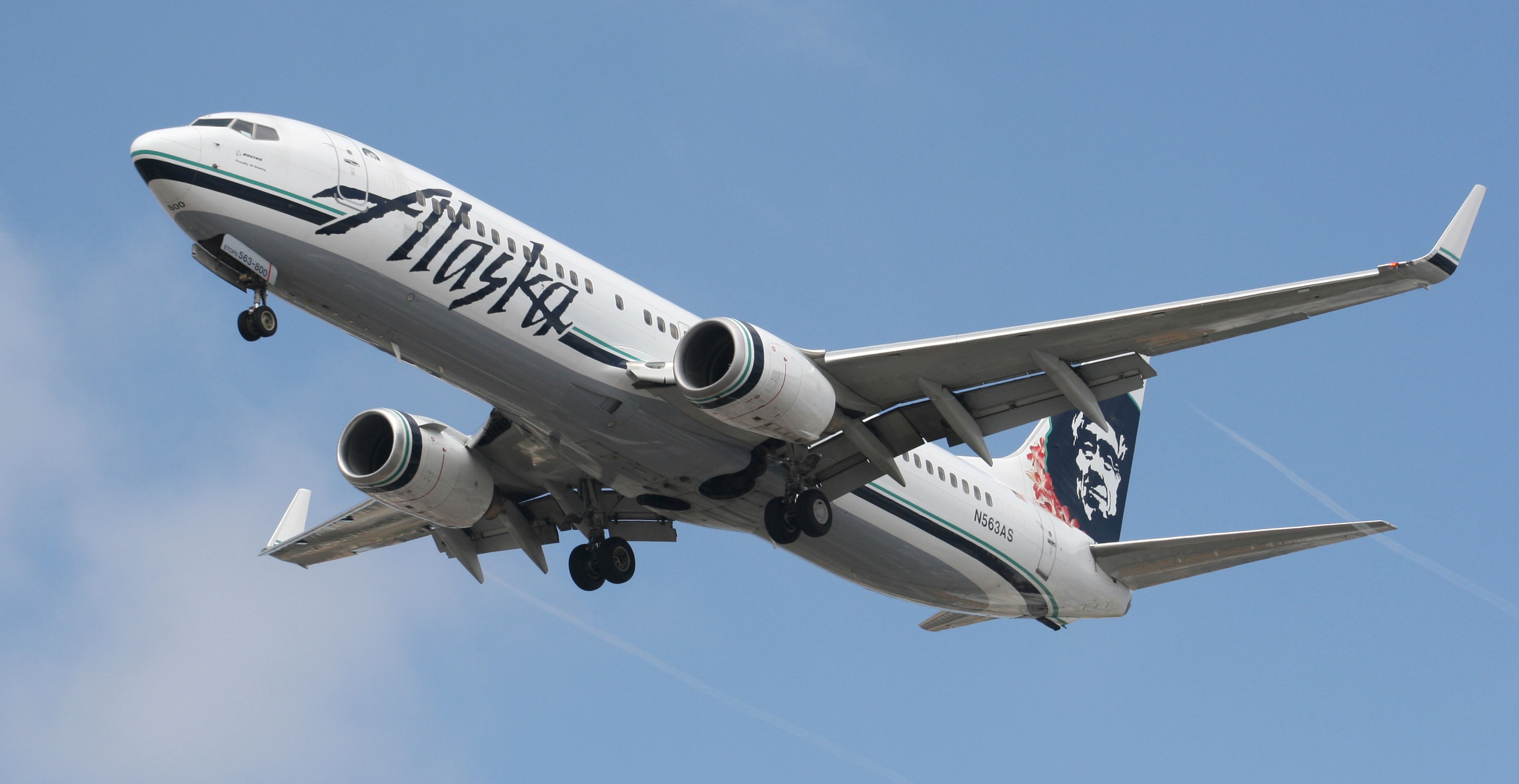 An Alaska Airlines flight made an emergency landing in Oregon after a window and chunk of its fuselage reportedly blew out in mid-air on Friday.