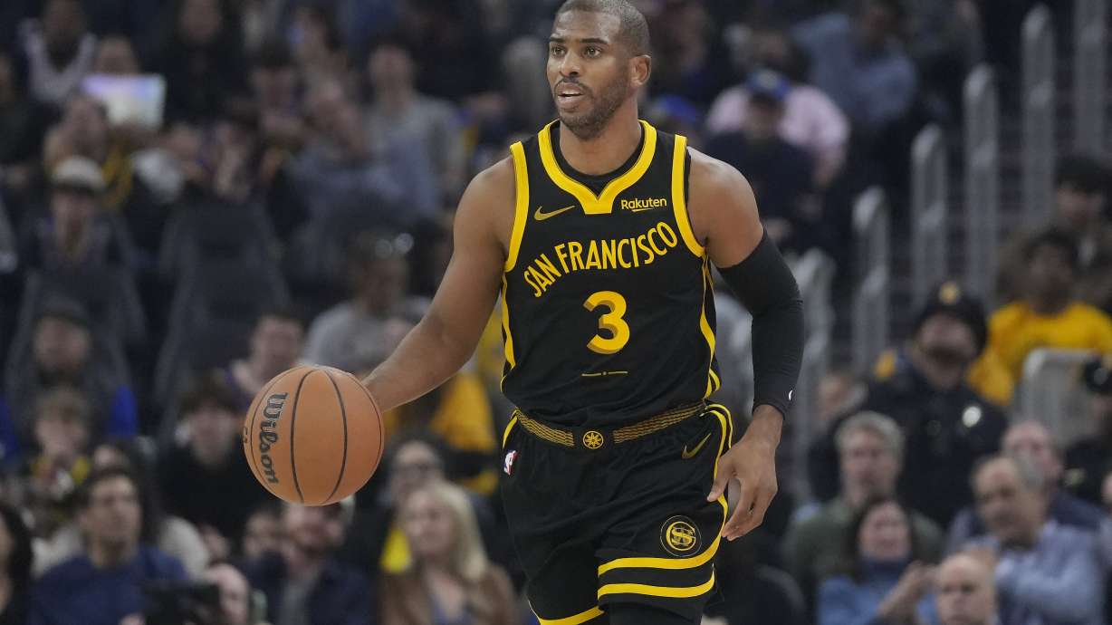 Golden State Warriors guard Chris Paul brings the ball up against the Detroit Pistons during the first half of an NBA basketball game in San Francisco, Friday, Jan. 5, 2024.
