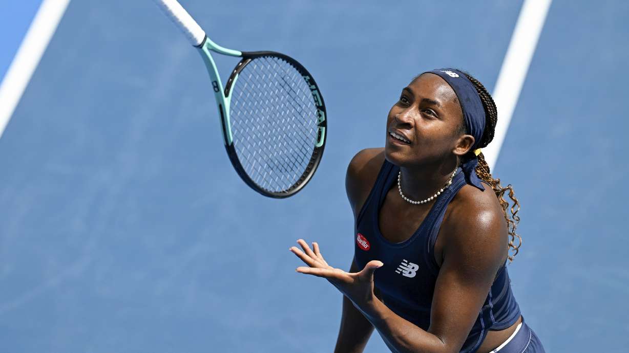 Coco Gauff of the United States throws her racket in the air during her semifinal match against compatriot Emma Navarro at the ASB Tennis Classic in Auckland, New Zealand, Saturday, Jan. 6, 2024.