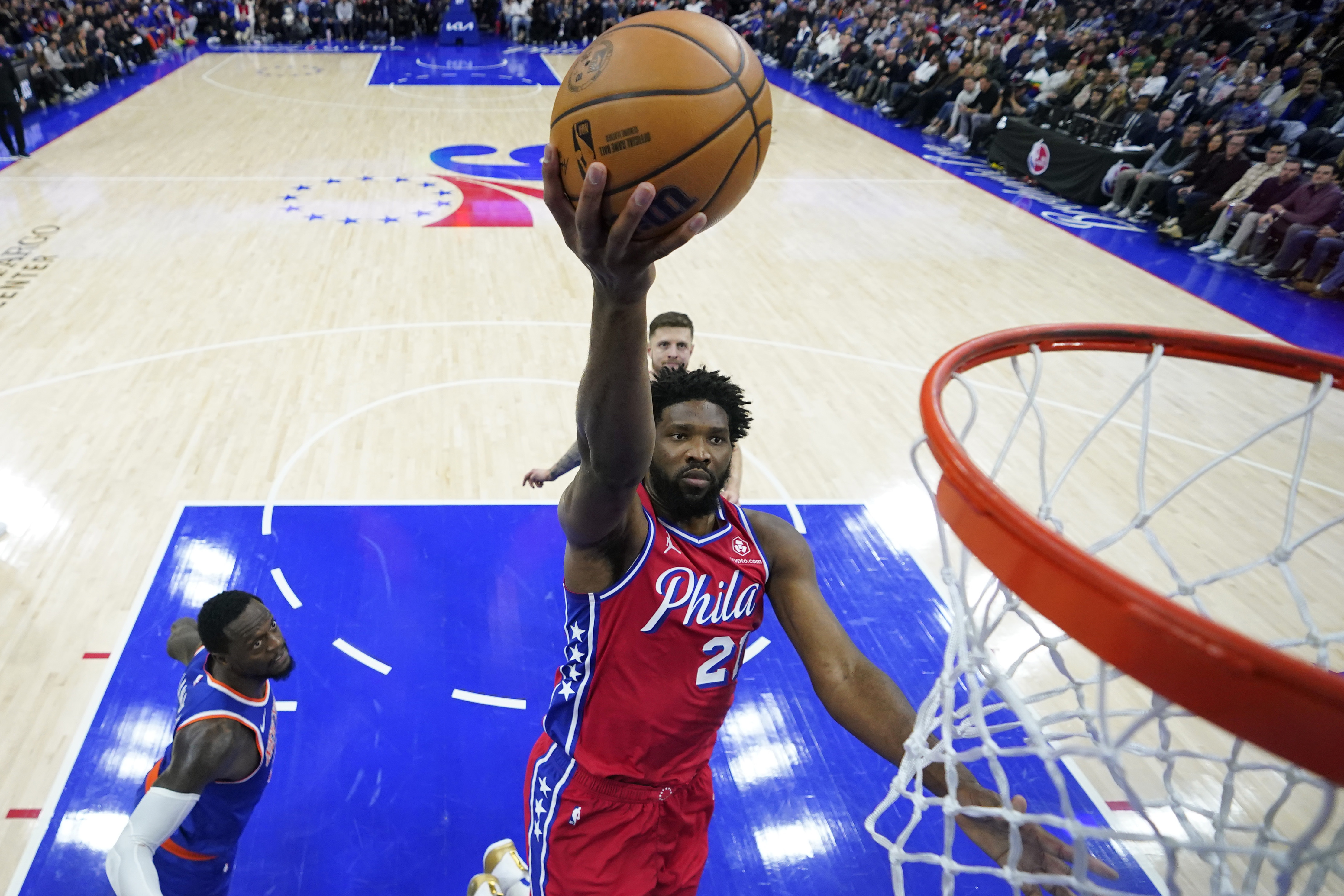 Philadelphia 76ers' Joel Embiid goes up for a shot during the first half of an NBA basketball game against the New York Knicks, Friday, Jan. 5, 2024, in Philadelphia. 