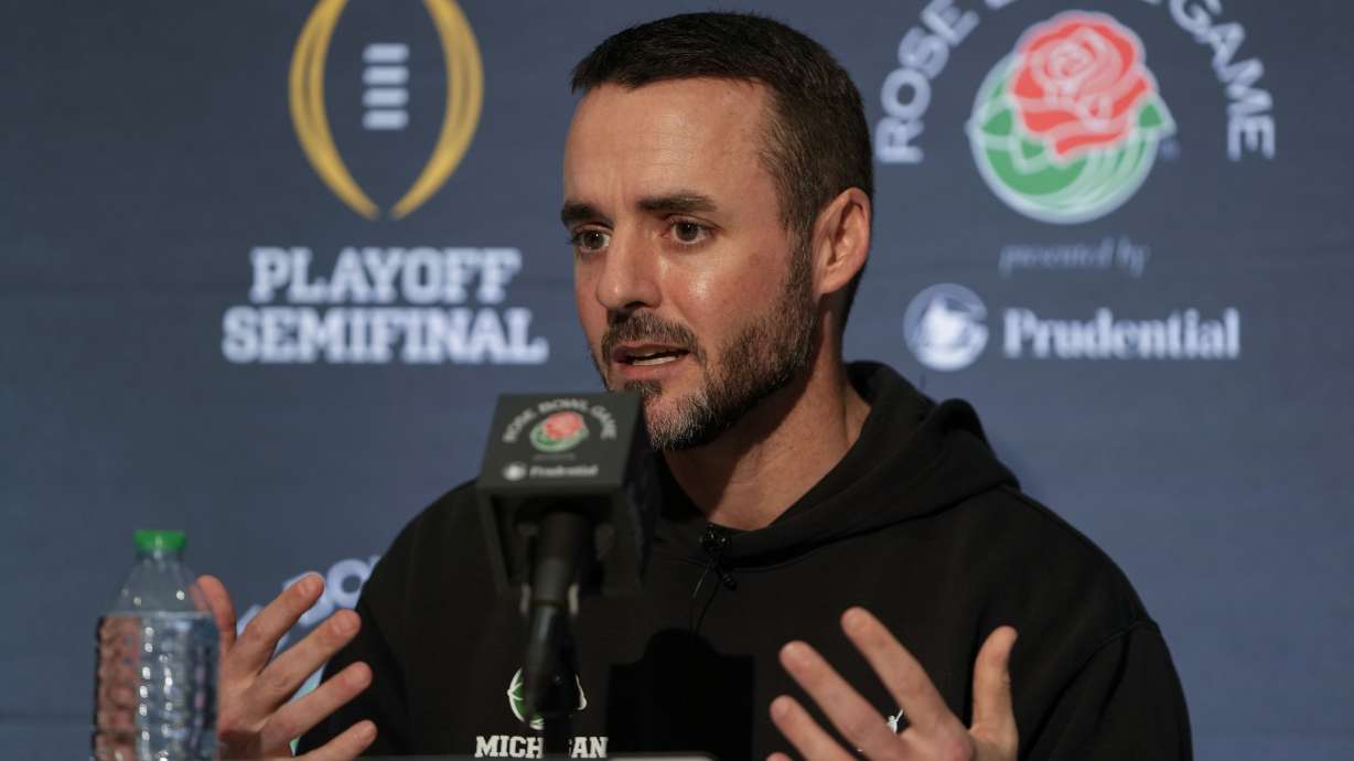 Michigan defensive coordinator Jesse Minter speaks to reporters during a news conference on Thursday, Dec. 28, 2023, in Los Angeles. Michigan is scheduled to play against Alabama on New Year's Day in the Rose Bowl, a semifinal in the College Football Playoff.