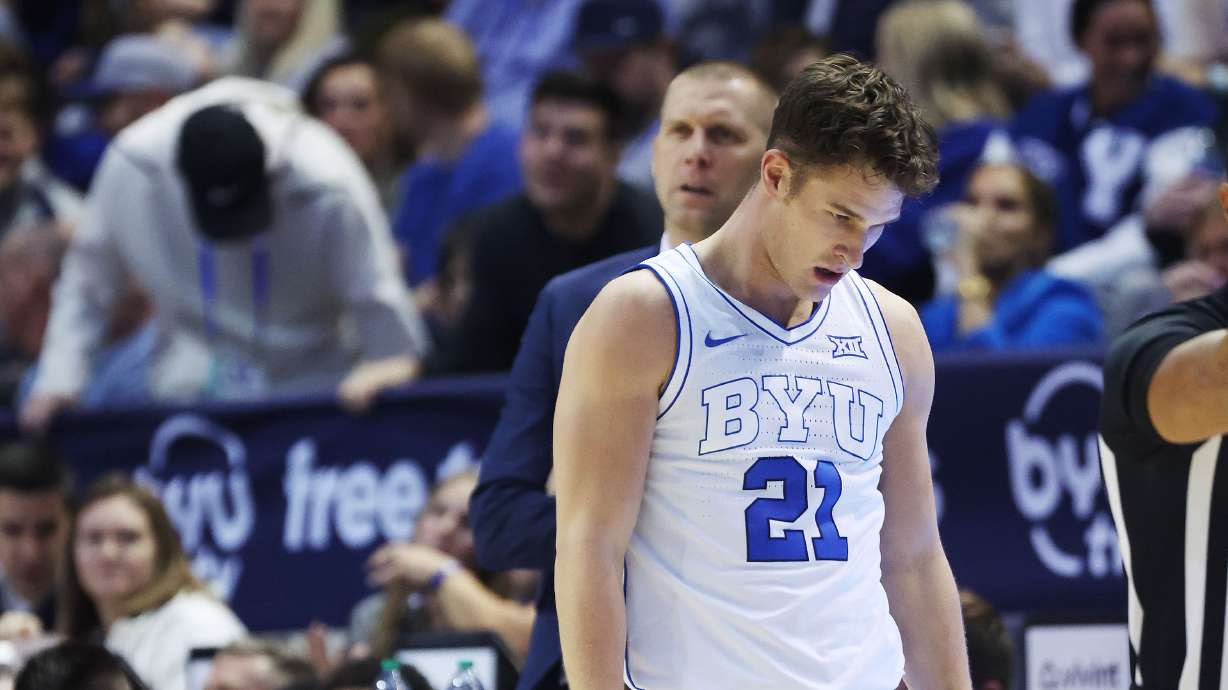 Brigham Young guard Trevin Knell (21) reacts after being fouled by Cincinnati Bearcats in Provo on Saturday, Jan. 6, 2024. Cincinnati won 71-60.
