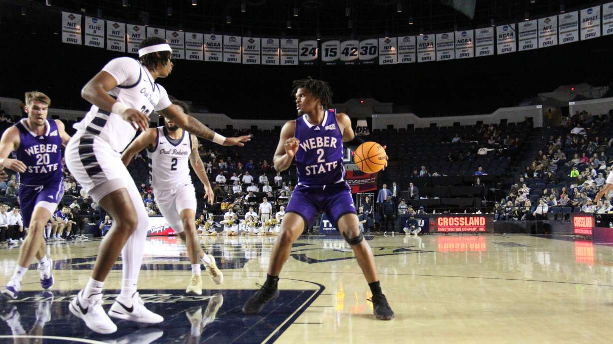 Weber State's Dillon Jones looks to pass during an NCAA men's basketball game against Oral Roberts, Saturday, Jan. 6, 2024 in Tulsa, Oklahoma.
