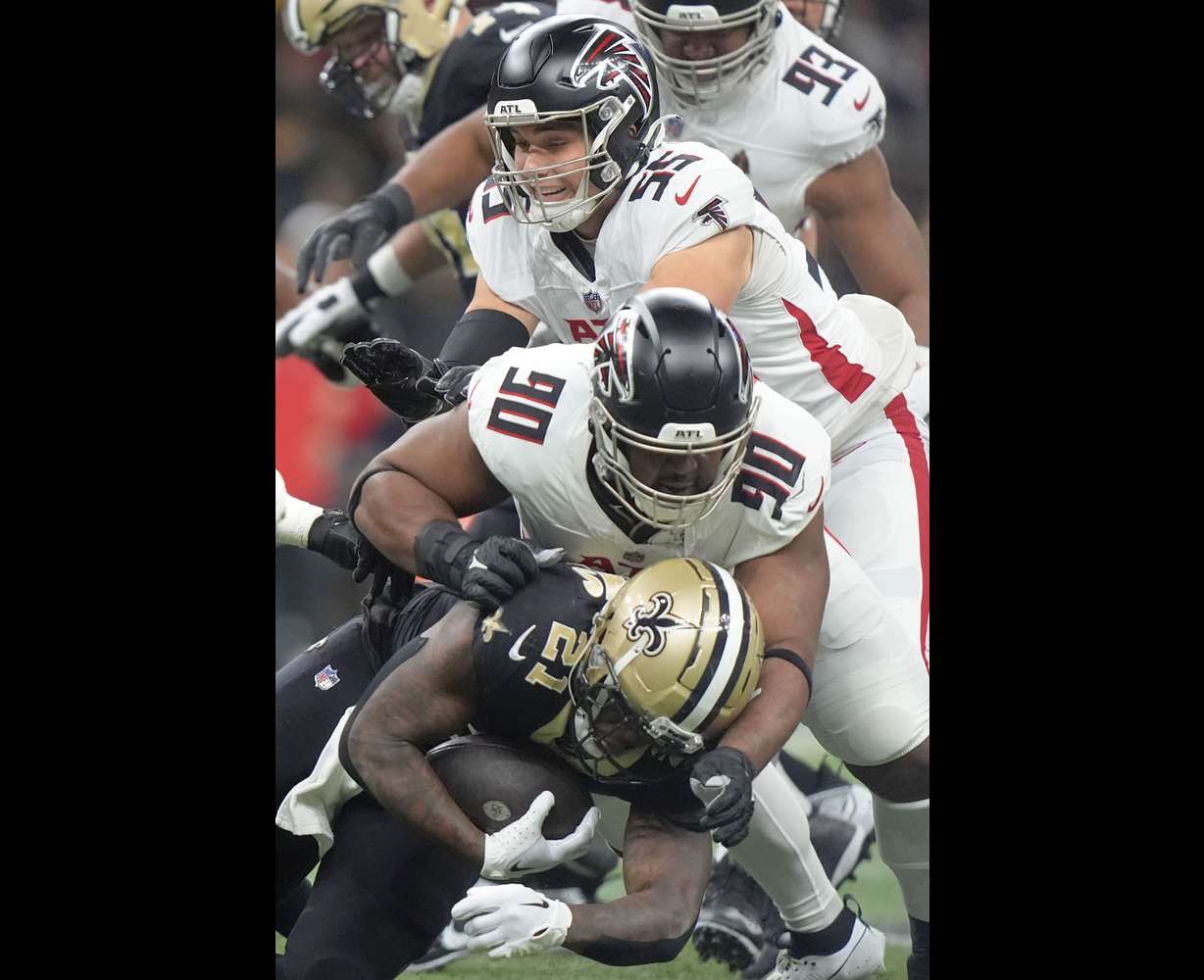 New Orleans Saints running back Jamaal Williams (21) carries the ball in the first half of an NFL football game against the Atlanta Falcons in New Orleans, Sunday, Jan. 7, 2024.